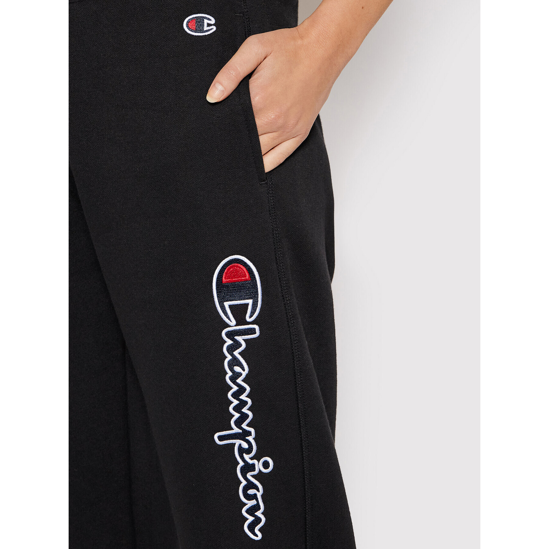 Champion Долнище анцуг Script Logo 114471 Черен Regular Fit - Pepit.bg