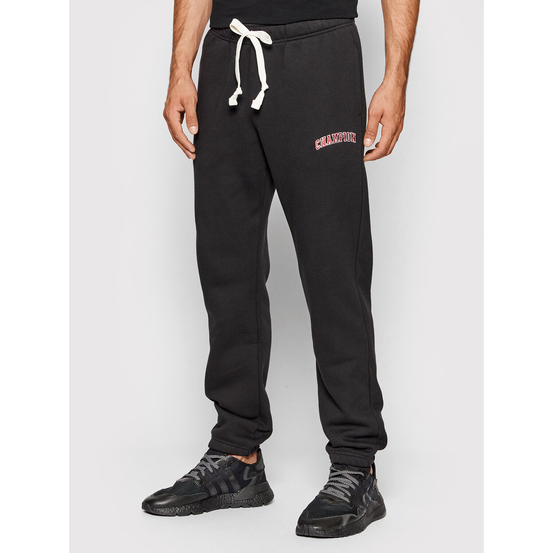 Champion Долнище анцуг Varsity Script Logo 216579 Черен Regular Fit - Pepit.bg