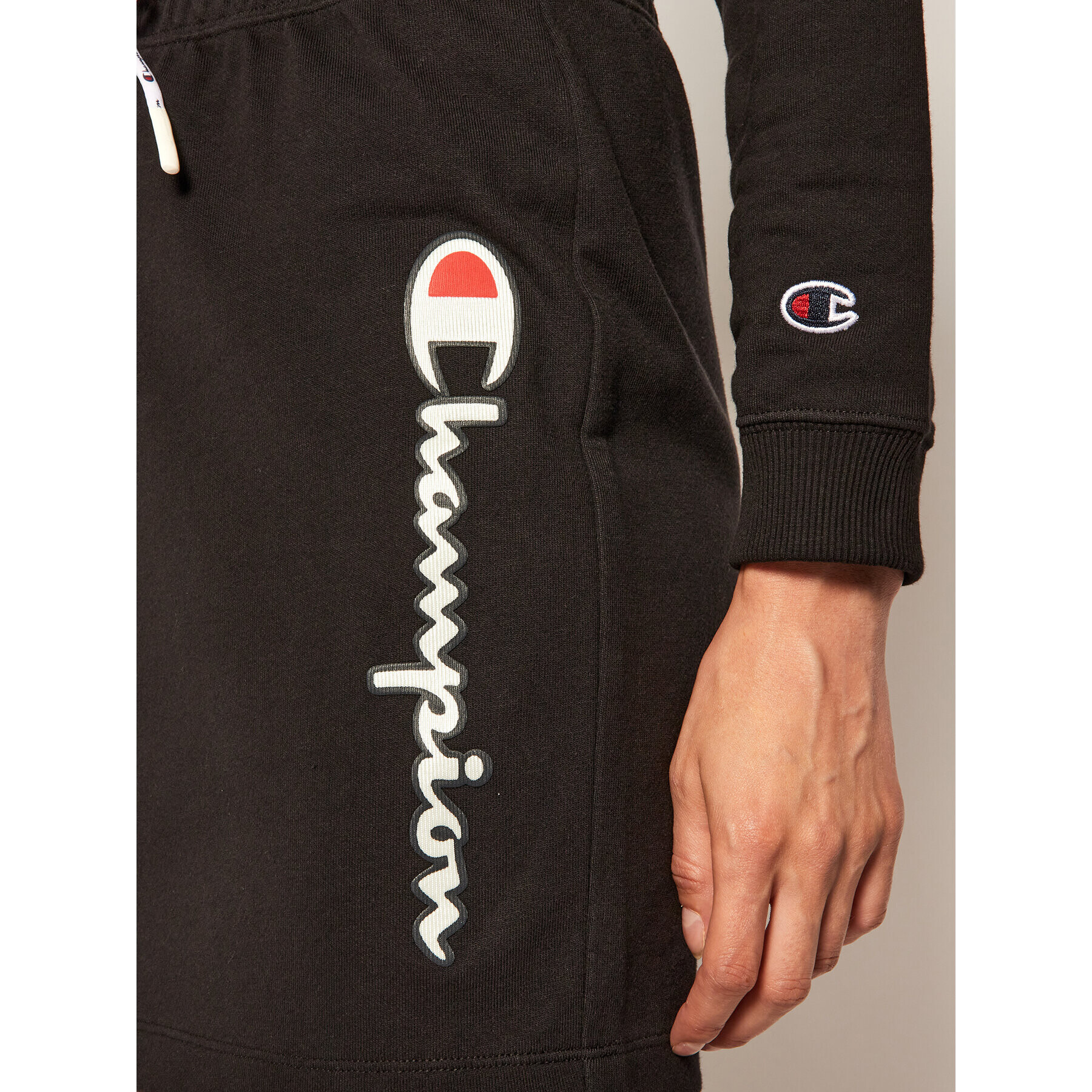 Champion Мини пола Vertical Script Logo 112649 Черен Custom Fit - Pepit.bg