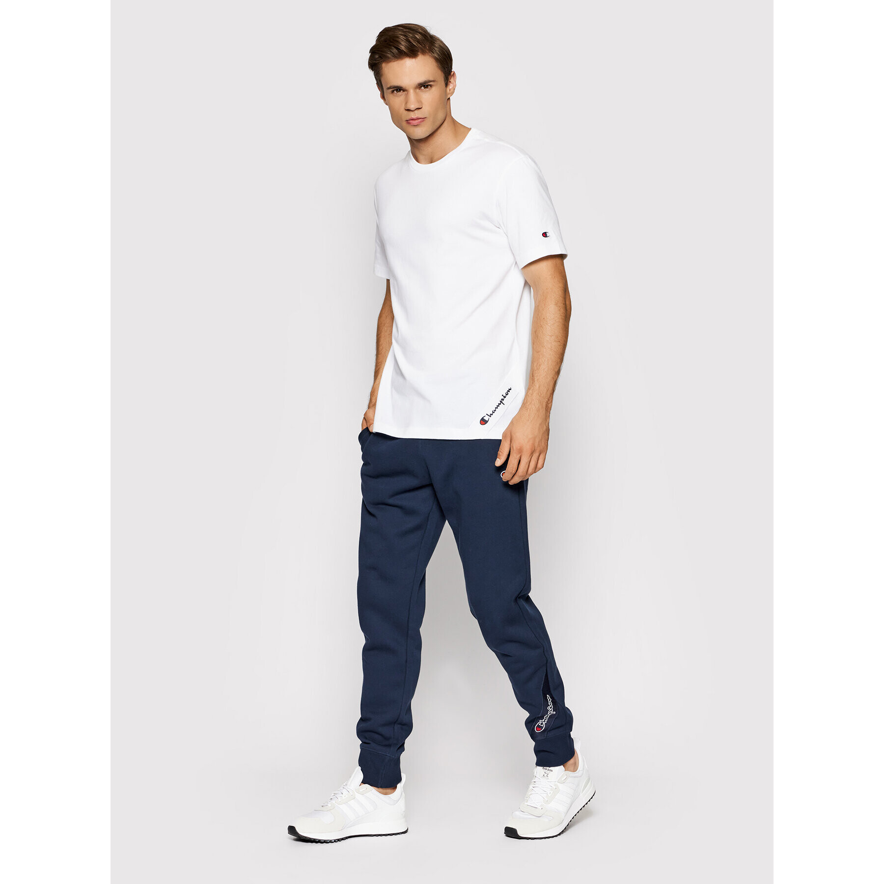 Champion Тишърт Asymmetric Script Logo 216553 Бял Regular Fit - Pepit.bg