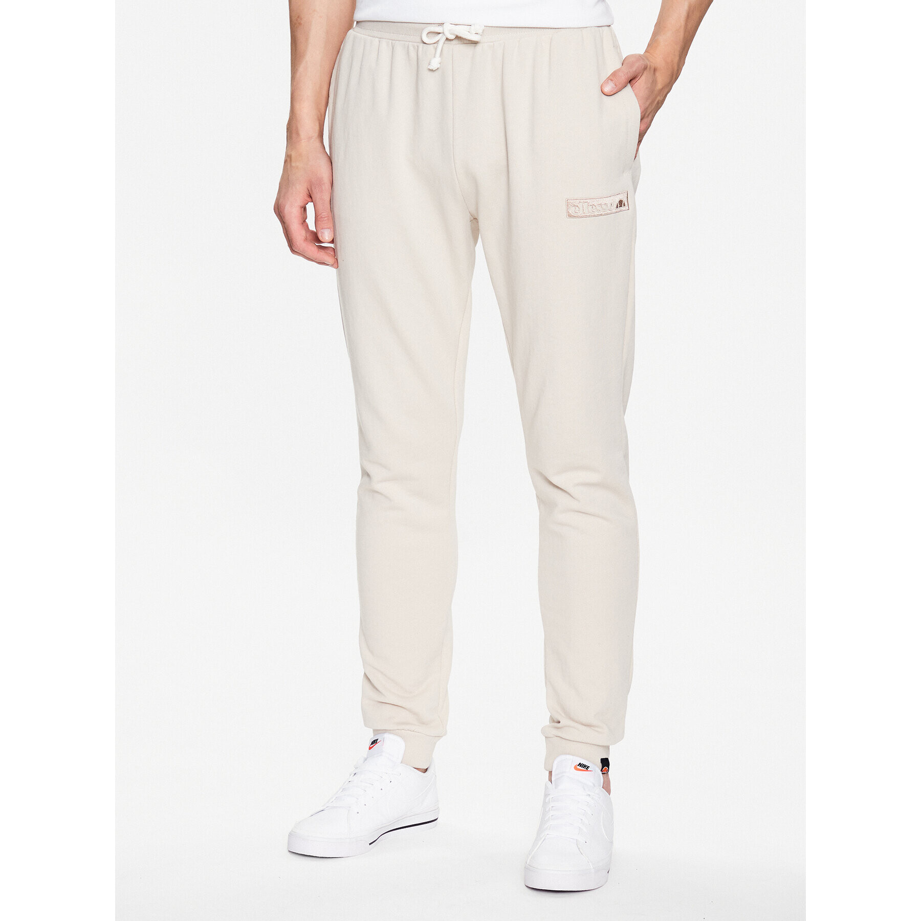 Ellesse Долнище анцуг Coperchiata SHR17563 Бежов Regular Fit - Pepit.bg