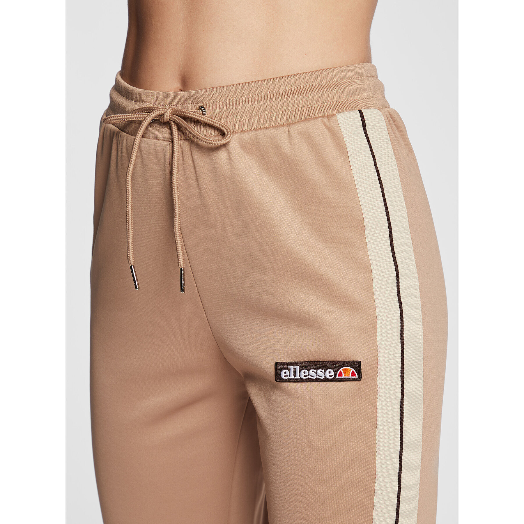 Ellesse Долнище анцуг Evelin Flared SGP15943 Бежов Regular Fit - Pepit.bg