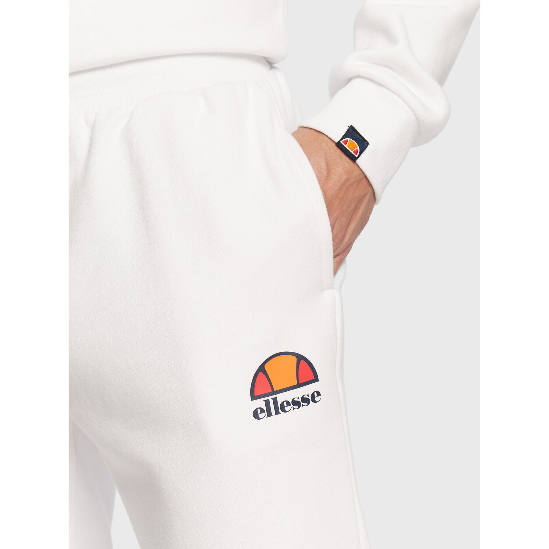 Ellesse Долнище анцуг Ovest SHS01763 Бял Regular Fit - Pepit.bg