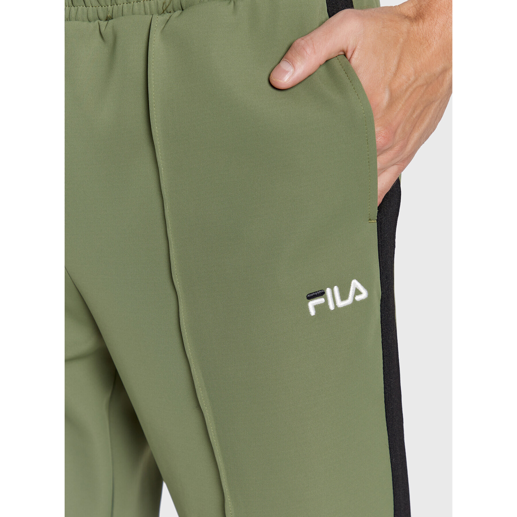 Fila Долнище анцуг Bruges FAM0174 Зелен Regular Fit - Pepit.bg