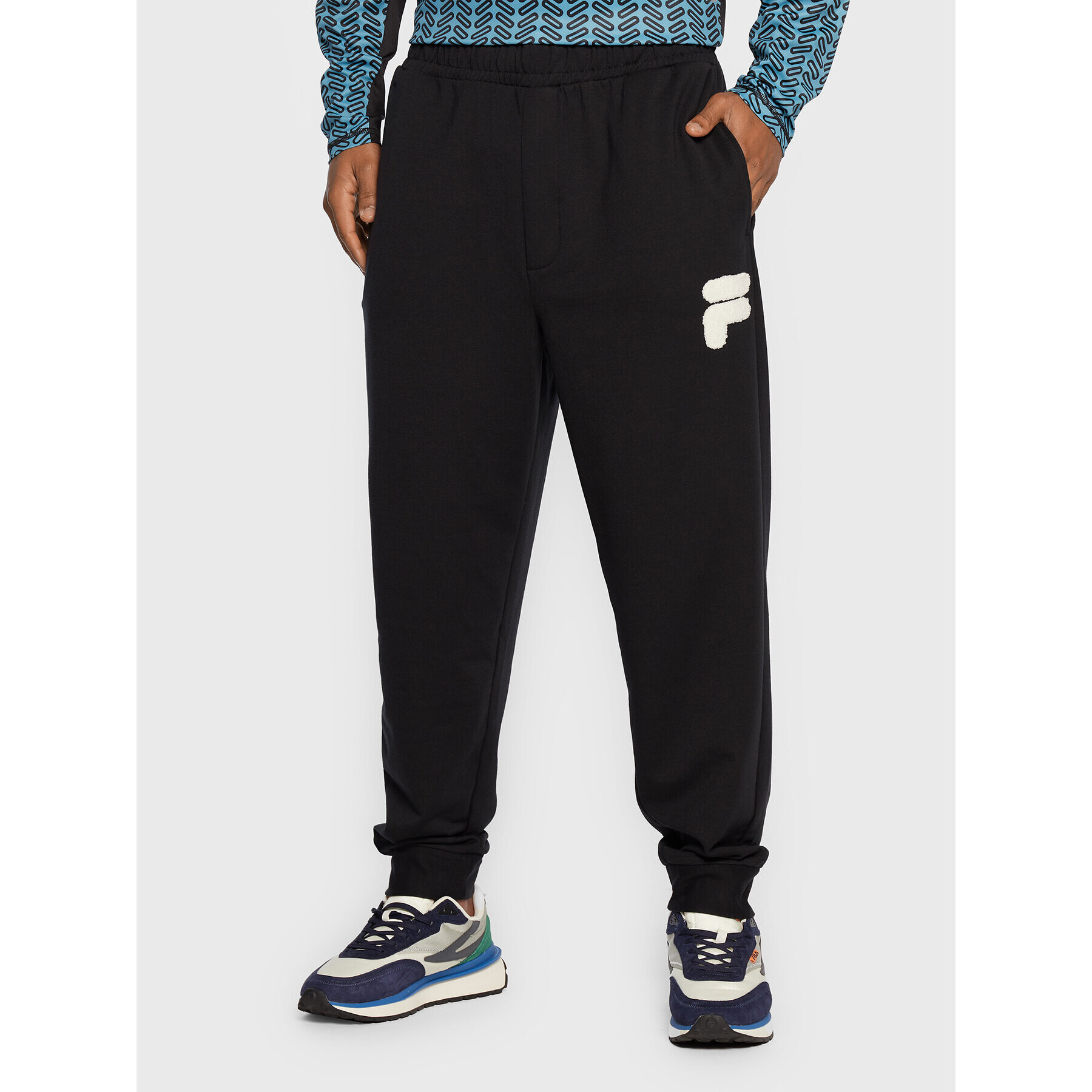 Fila Долнище анцуг Chiasso Dropped Crotch FAM0138 Черен Regular Fit - Pepit.bg