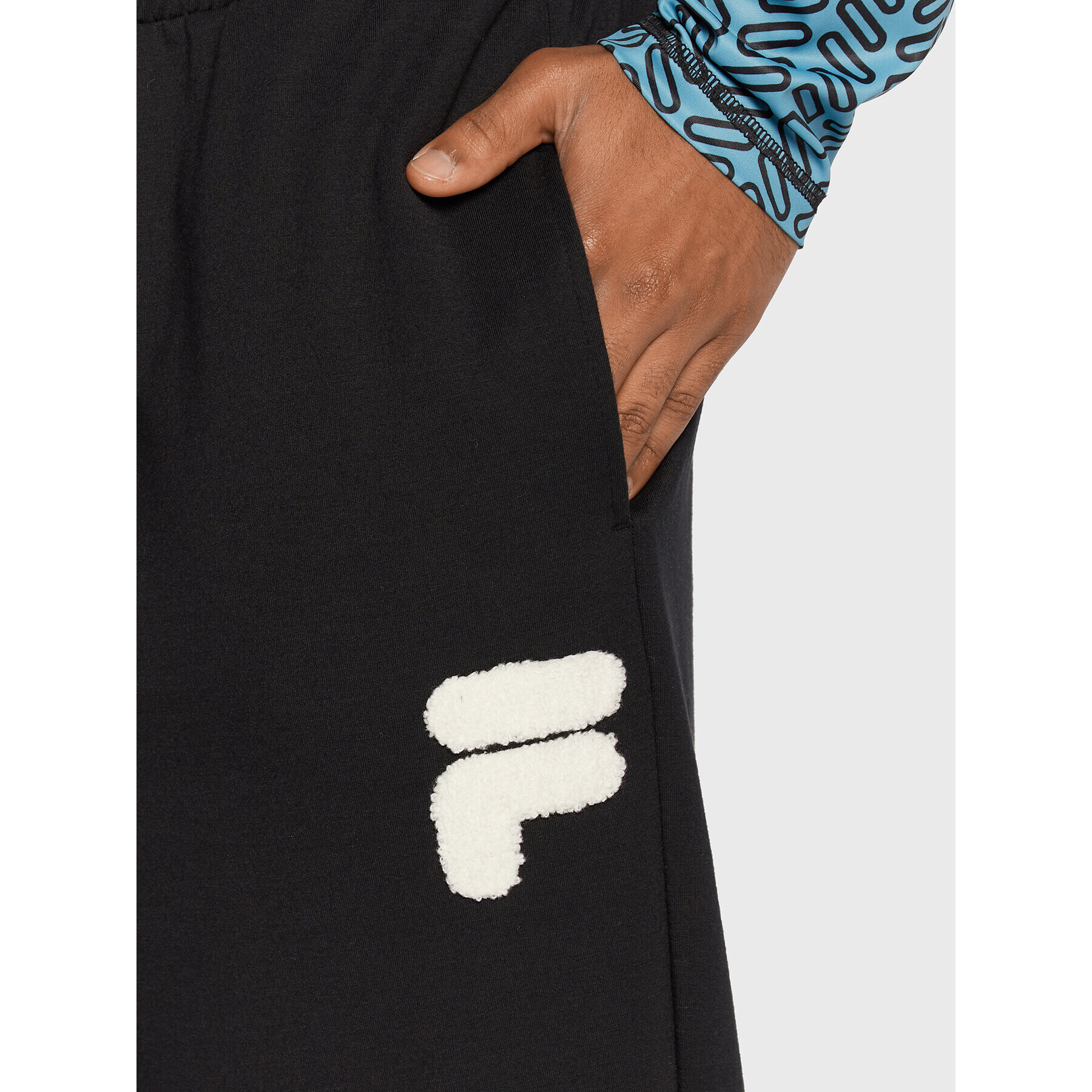 Fila Долнище анцуг Chiasso Dropped Crotch FAM0138 Черен Regular Fit - Pepit.bg