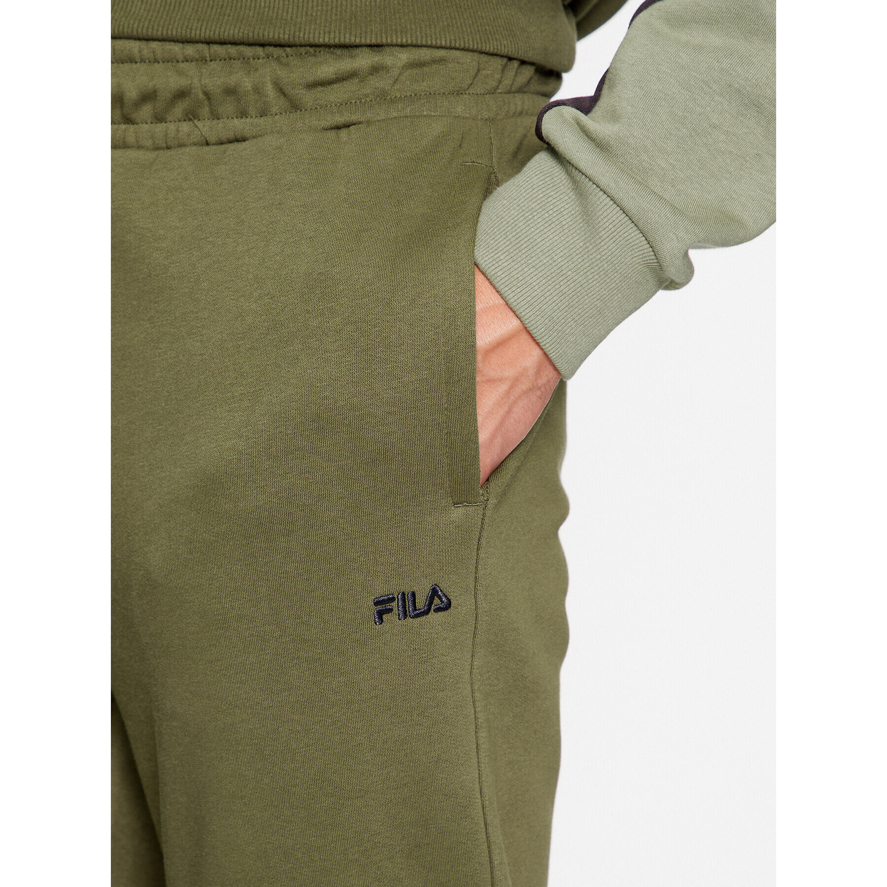 Fila Долнище анцуг FAM0500 Зелен Regular Fit - Pepit.bg