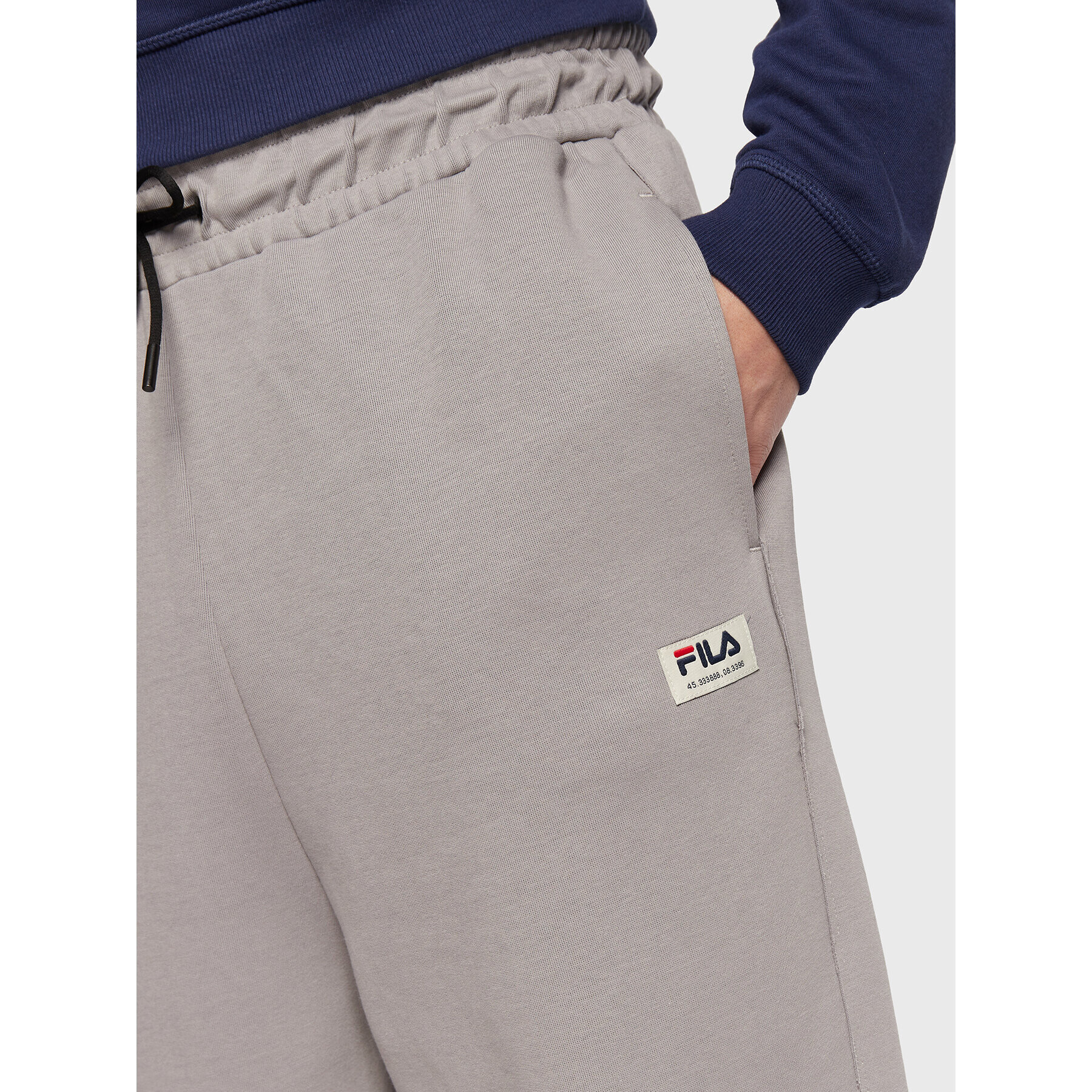 Fila Долнище анцуг Tricase FAM0153 Сив Oversize - Pepit.bg