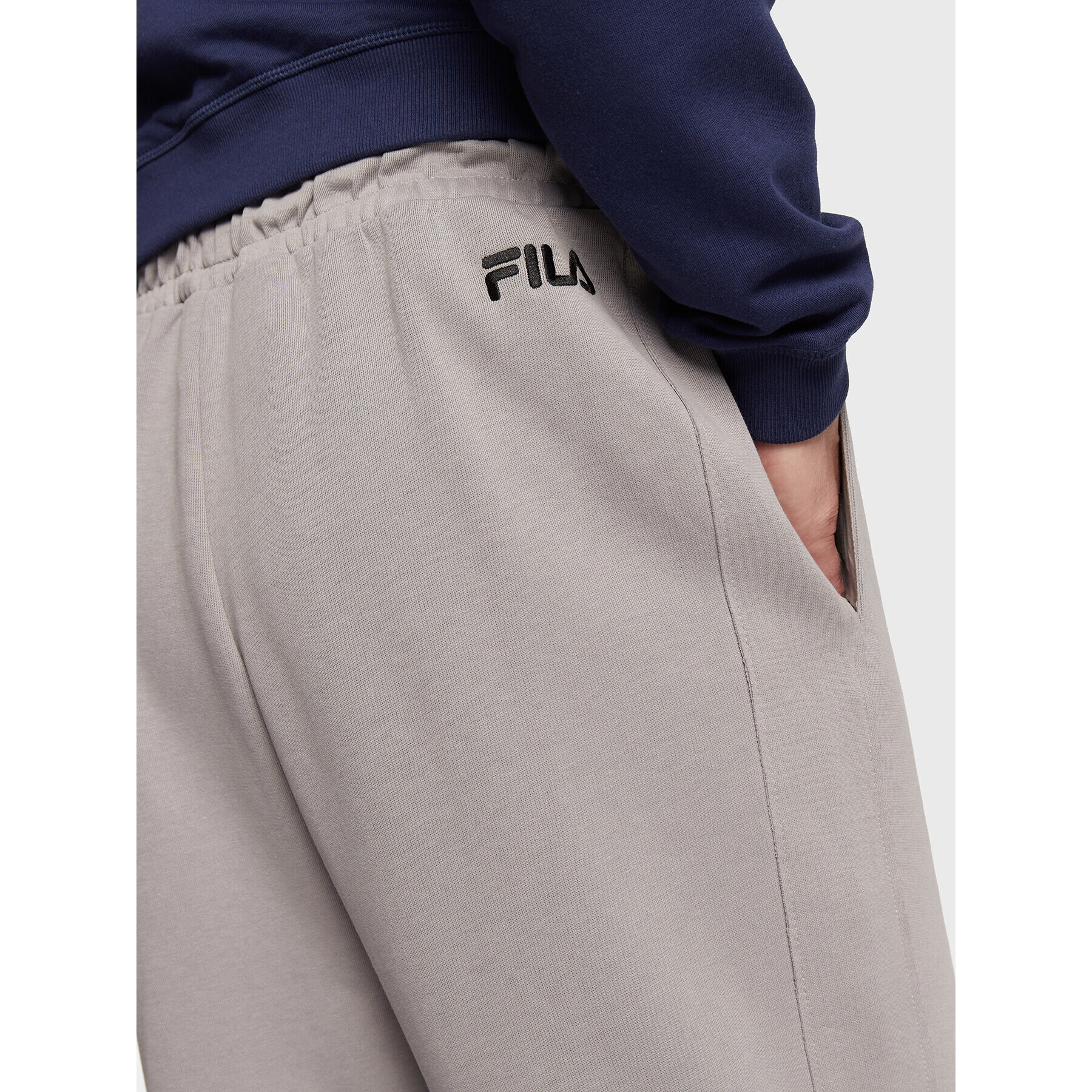 Fila Долнище анцуг Tricase FAM0153 Сив Oversize - Pepit.bg