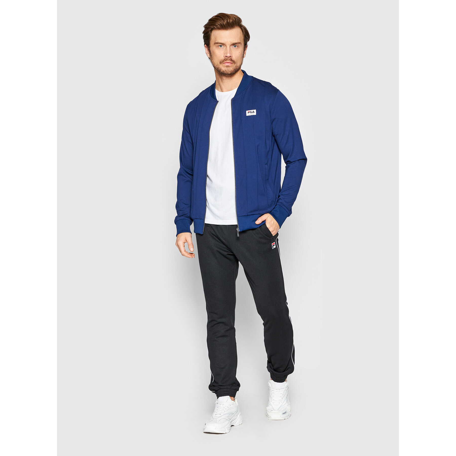 Fila Долнище анцуг Zvolen FAM0087 Черен Regular Fit - Pepit.bg