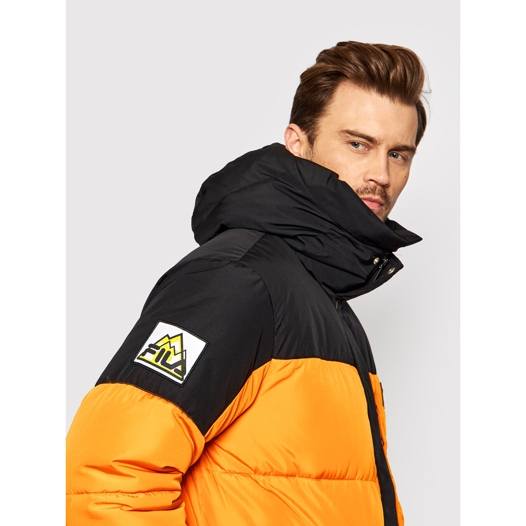 Fila Пухено яке Yves 688951 Оранжев Regular Fit - Pepit.bg