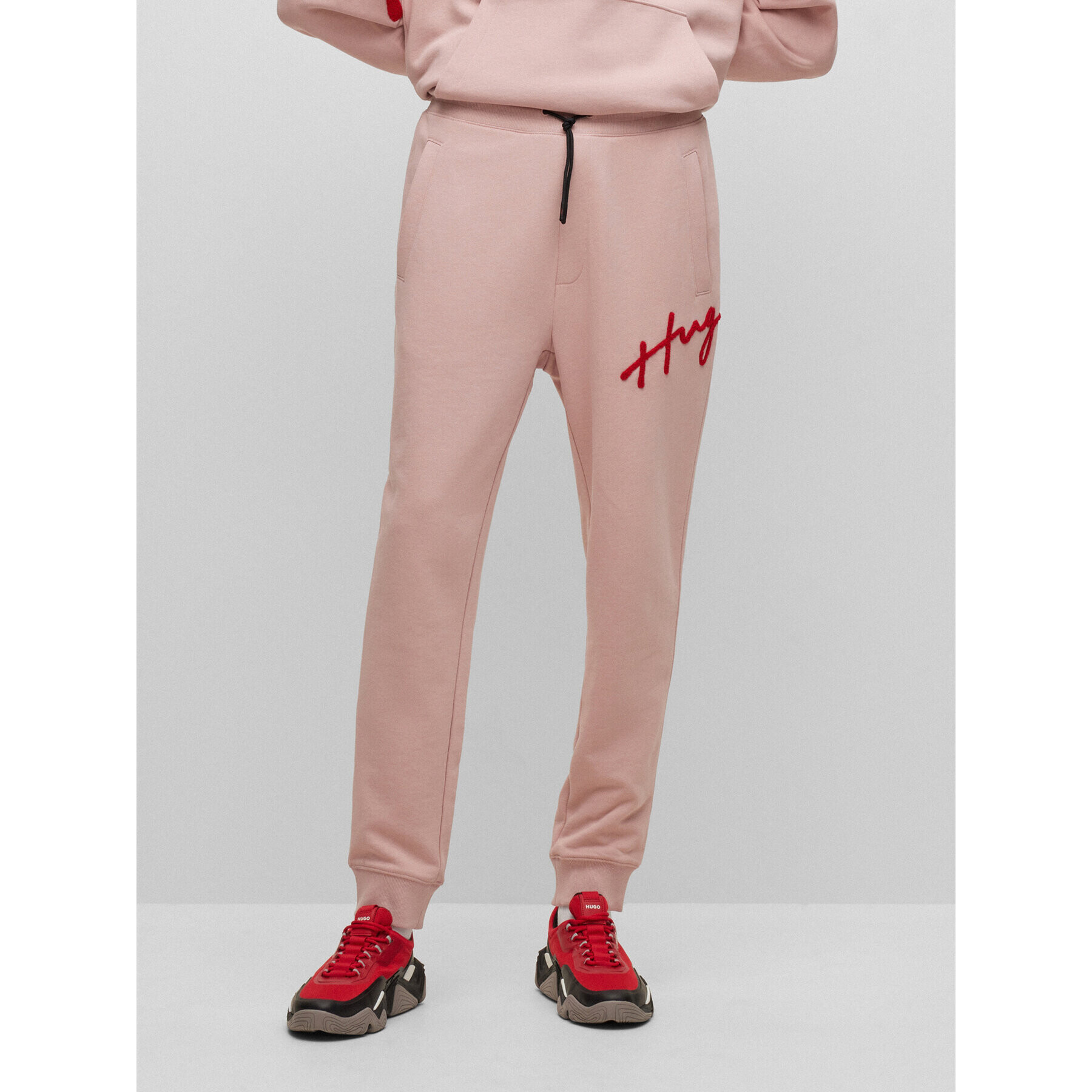 Hugo Долнище анцуг 50482921 Розов Regular Fit - Pepit.bg