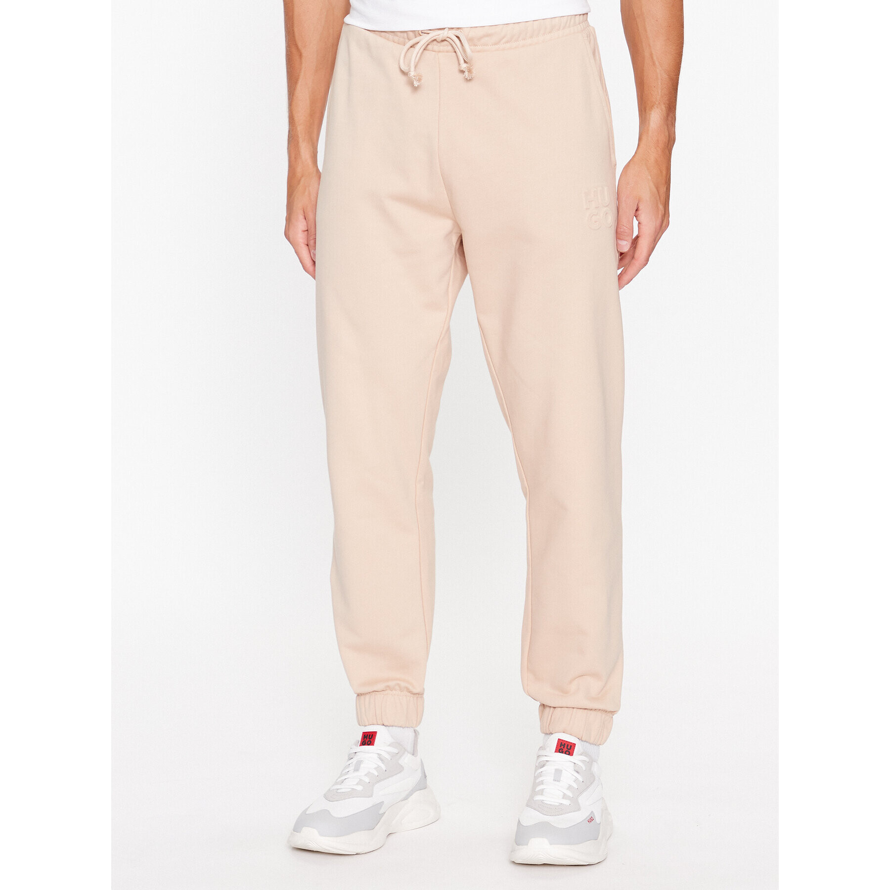 Hugo Долнище анцуг Dchard 50496652 Бежов Relaxed Fit - Pepit.bg