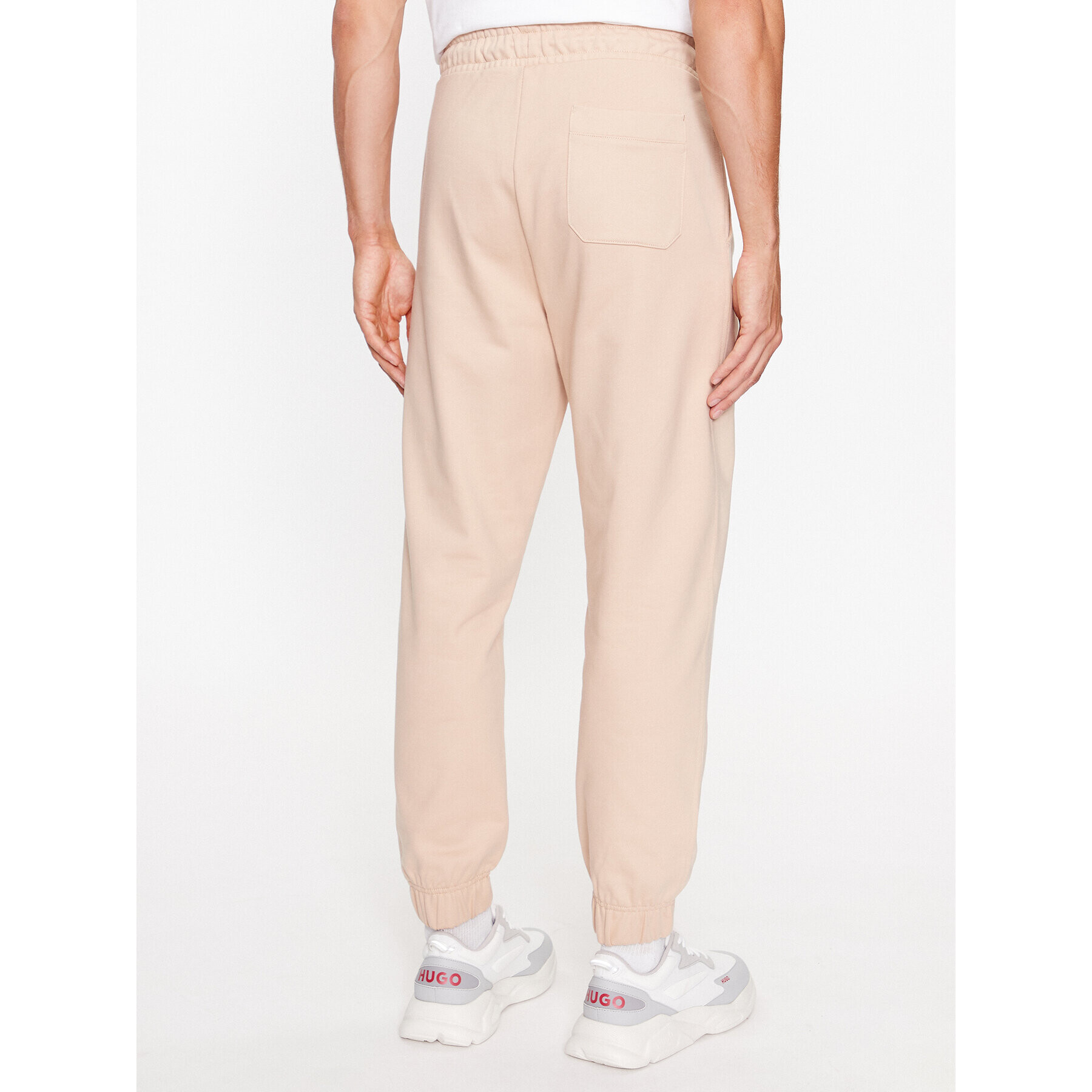 Hugo Долнище анцуг Dchard 50496652 Бежов Relaxed Fit - Pepit.bg
