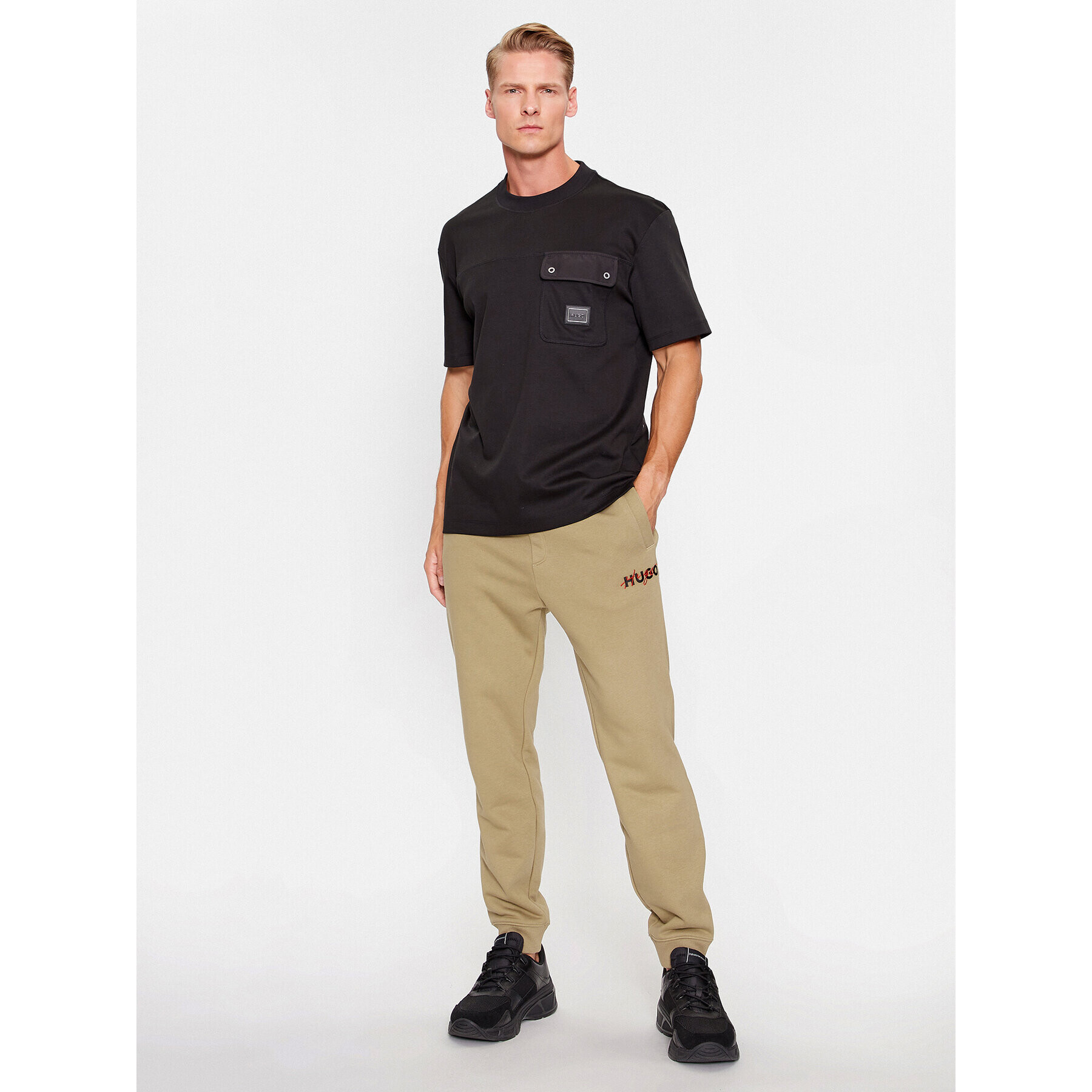 Hugo Долнище анцуг Drokko 50494571 Кафяв Relaxed Fit - Pepit.bg