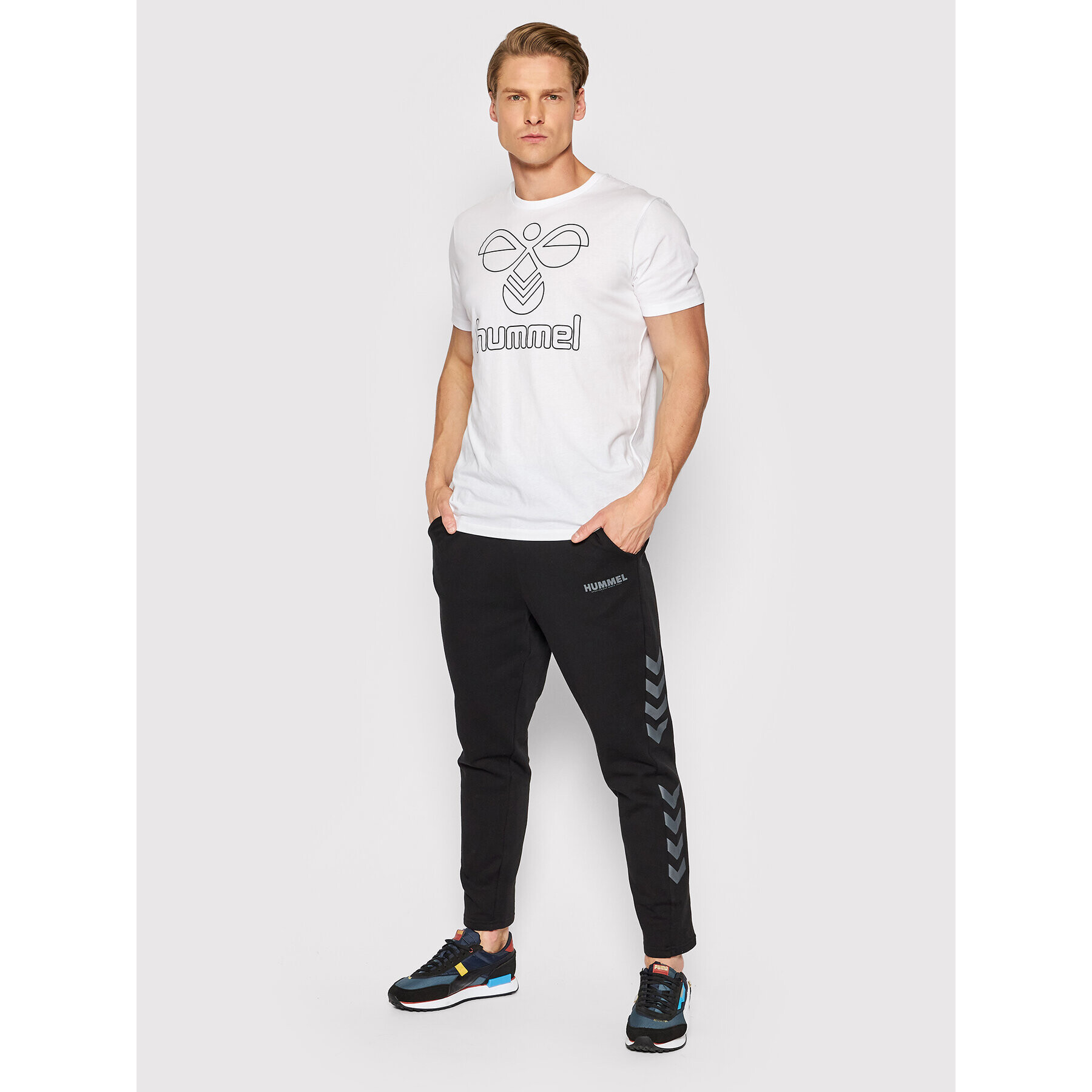 Hummel Долнище анцуг Legacy 212567 Черен Tapered Fit - Pepit.bg