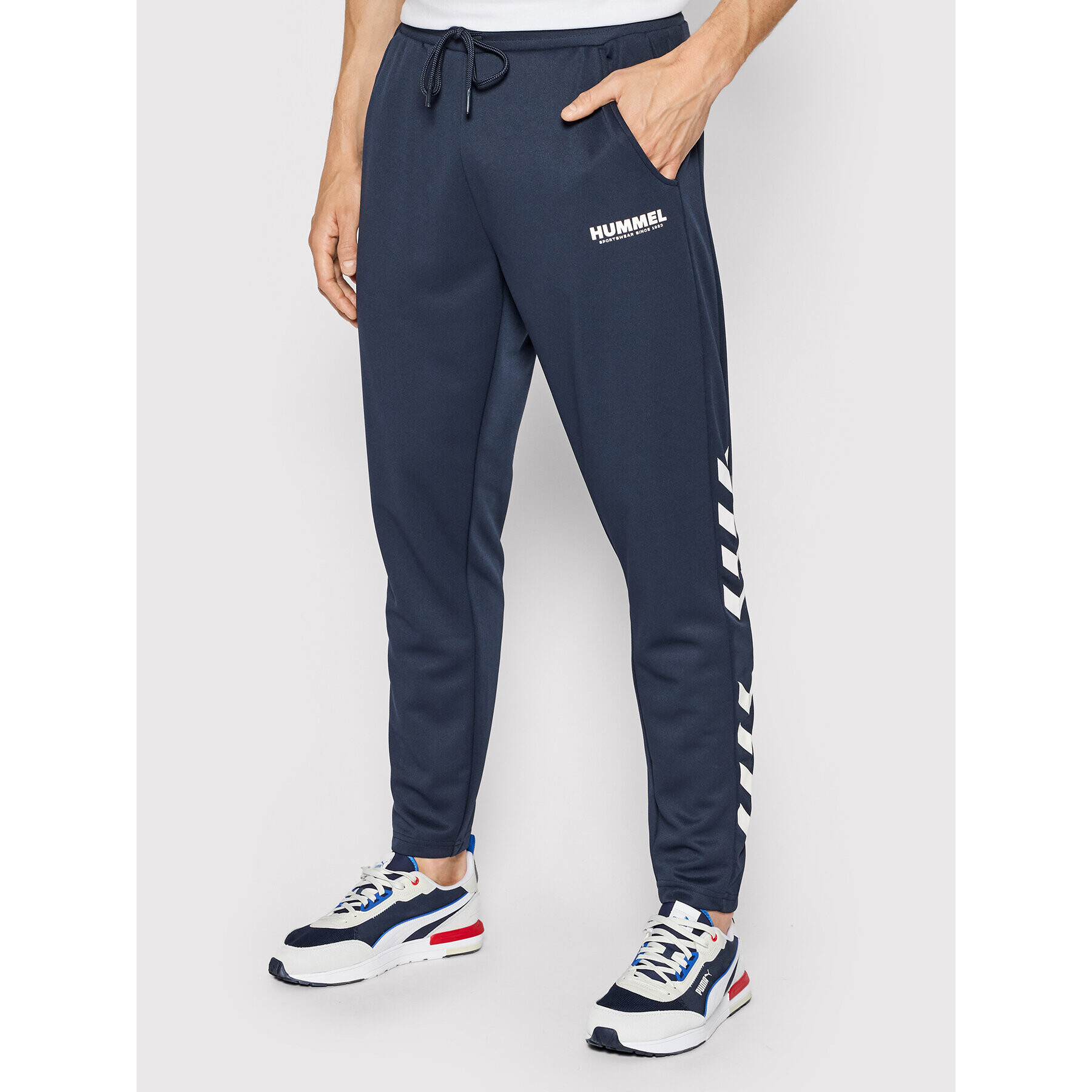 Hummel Долнище анцуг Legacy Poly 212688 Тъмносин Tapered Fit - Pepit.bg