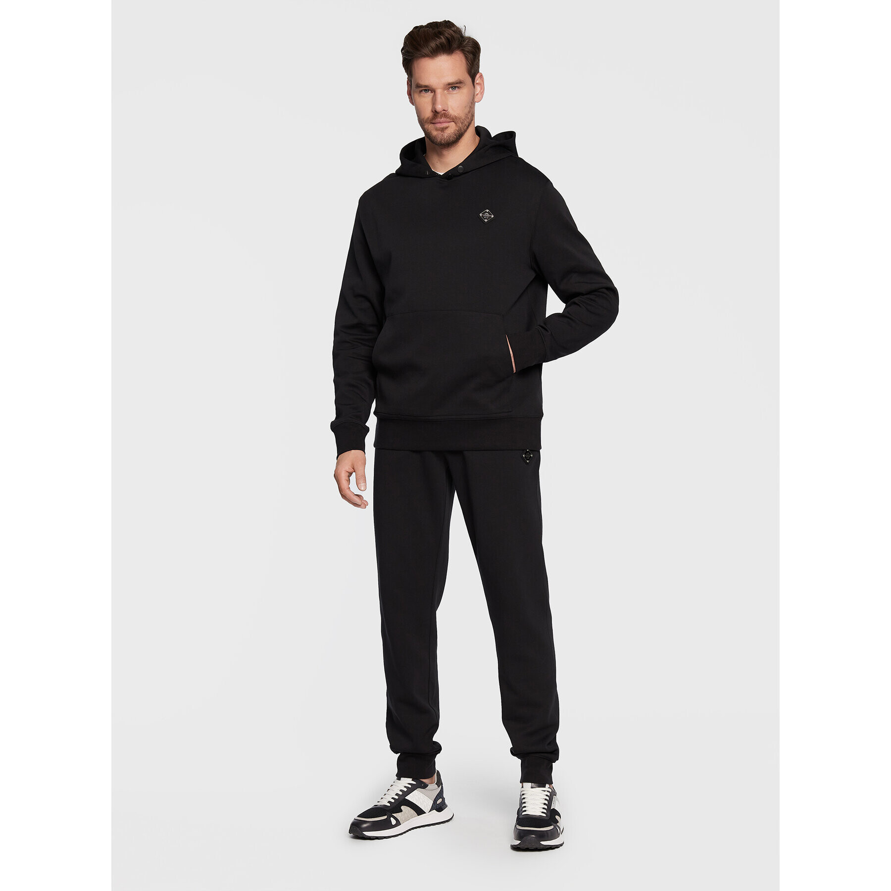 J.Lindeberg Долнище анцуг Creed FMJS0651 Черен Relaxed Fit - Pepit.bg