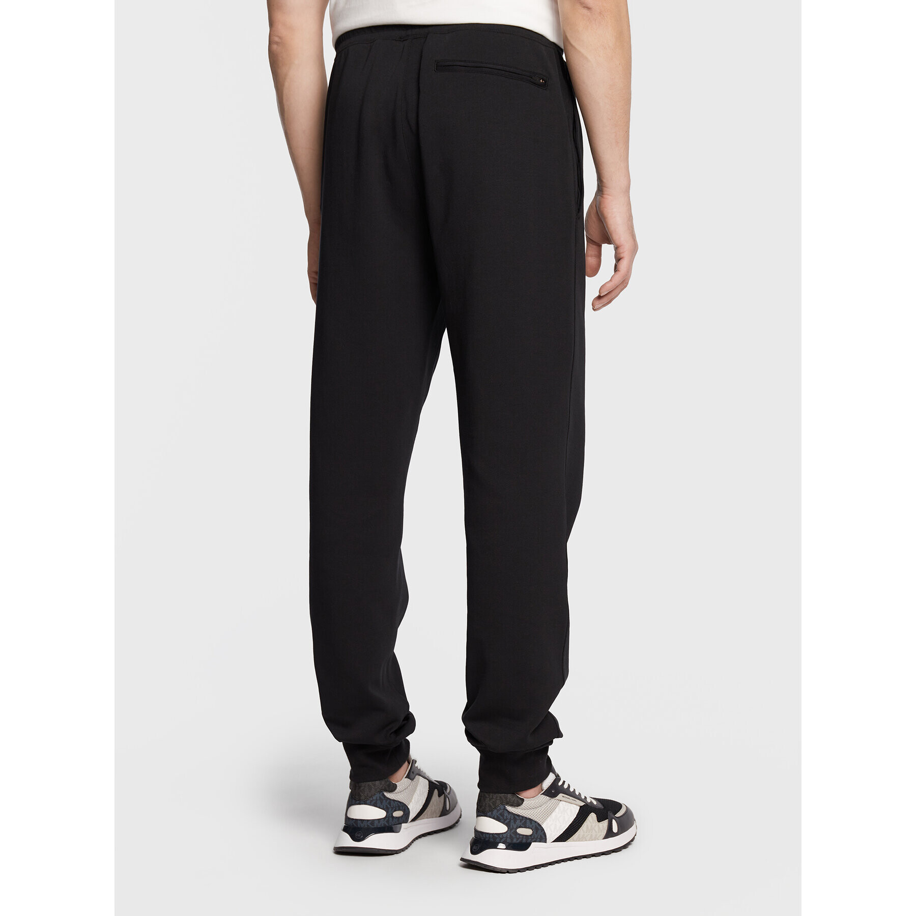 J.Lindeberg Долнище анцуг Creed FMJS0651 Черен Relaxed Fit - Pepit.bg