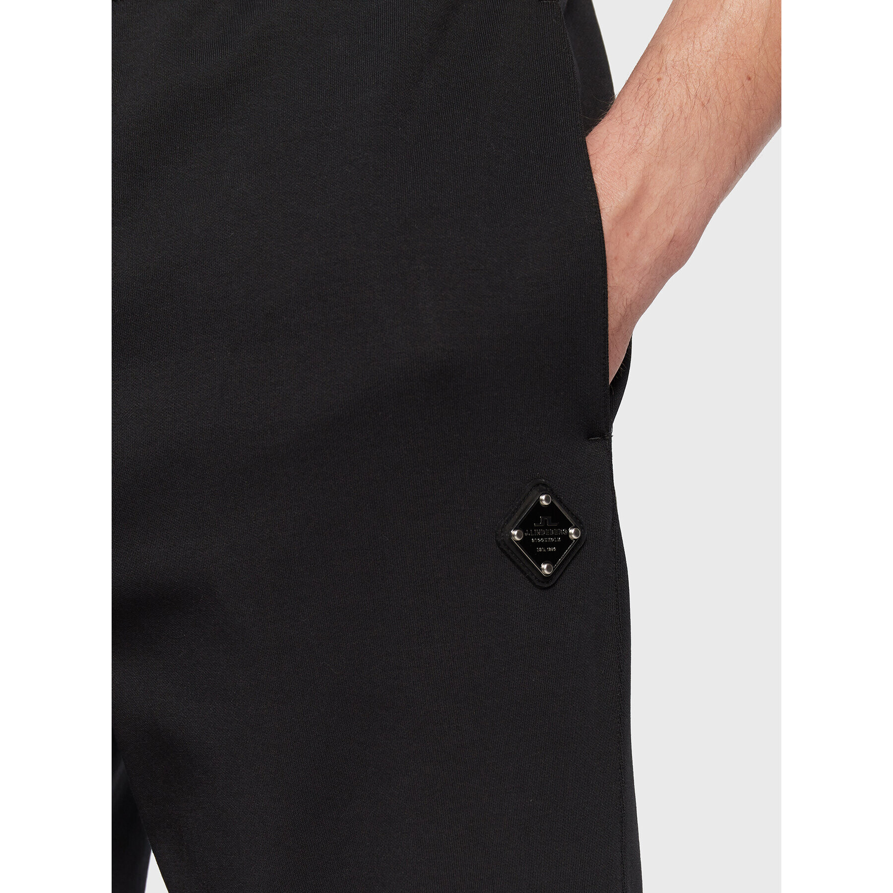 J.Lindeberg Долнище анцуг Creed FMJS0651 Черен Relaxed Fit - Pepit.bg