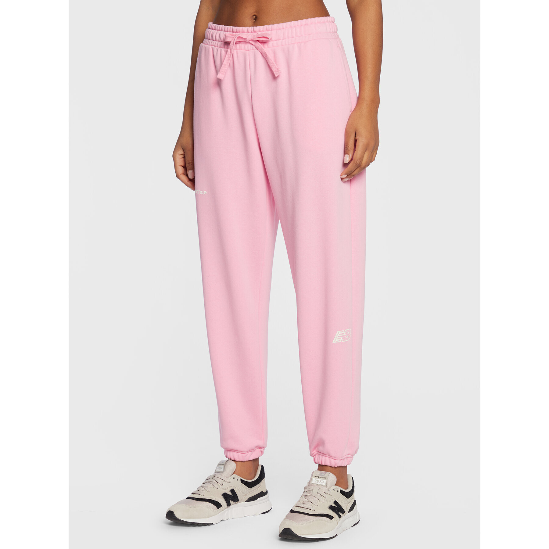 New Balance Долнище анцуг Essentials WP23508 Розов Relaxed Fit - Pepit.bg