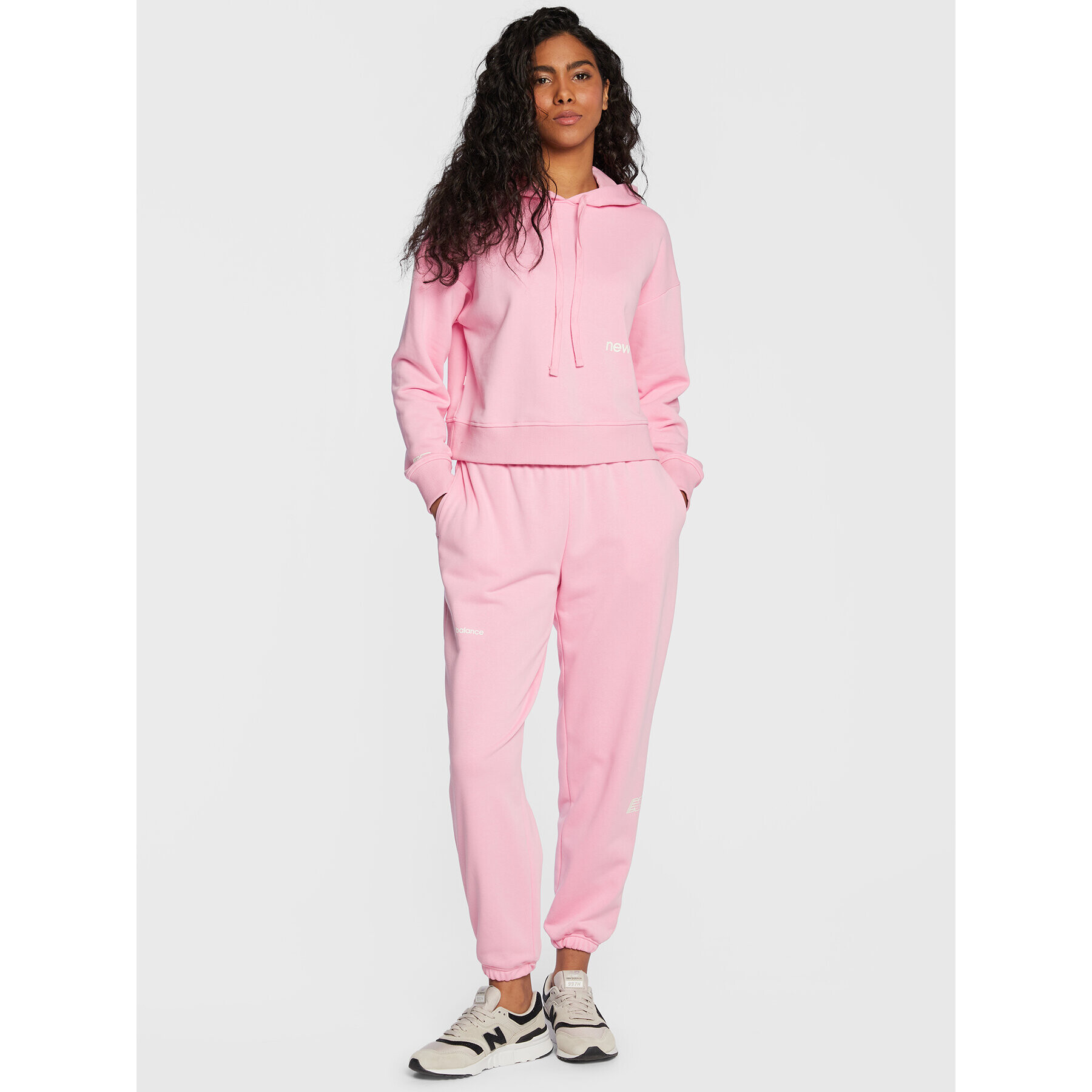 New Balance Долнище анцуг Essentials WP23508 Розов Relaxed Fit - Pepit.bg