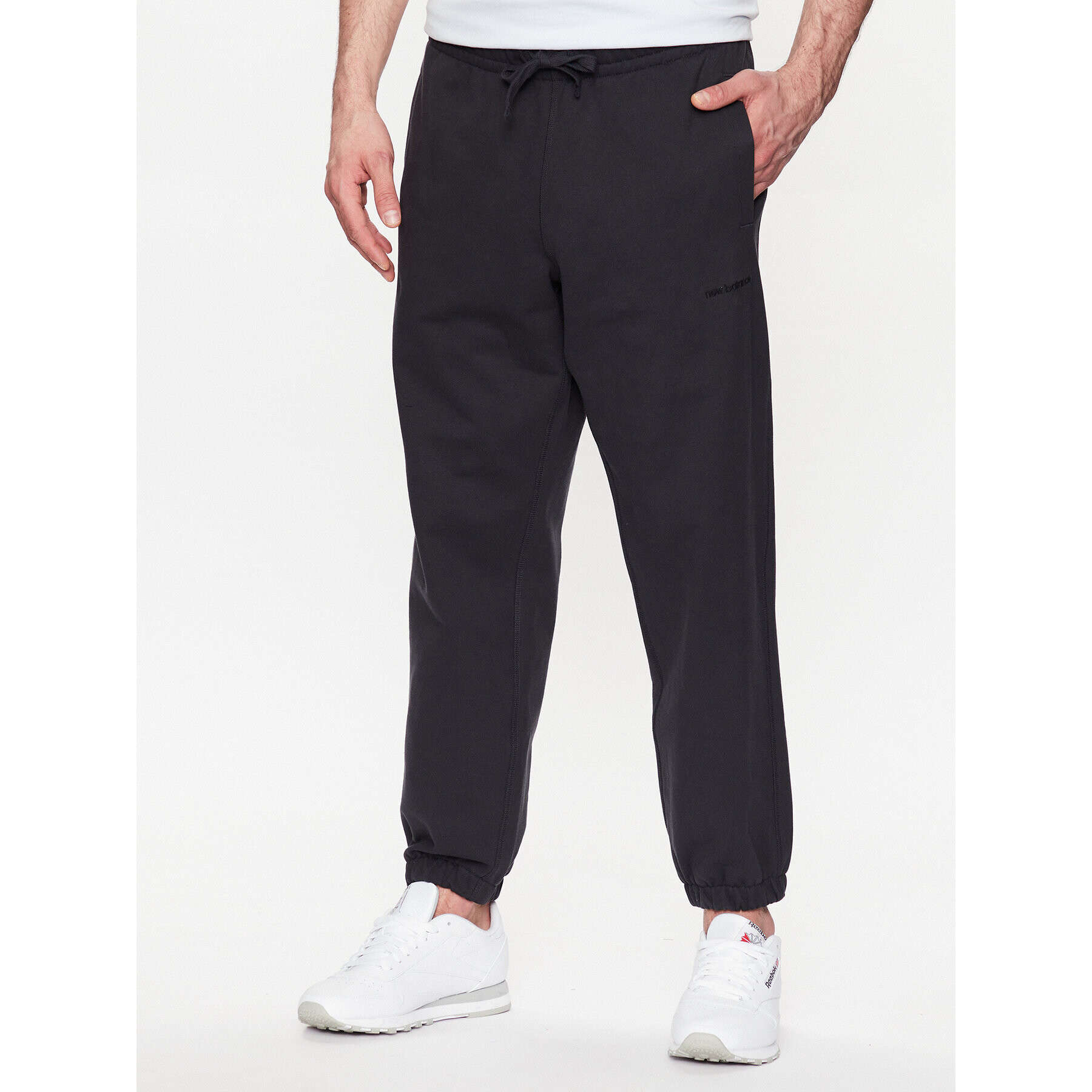 New Balance Долнище анцуг MP23551 Черен Relaxed Fit - Pepit.bg