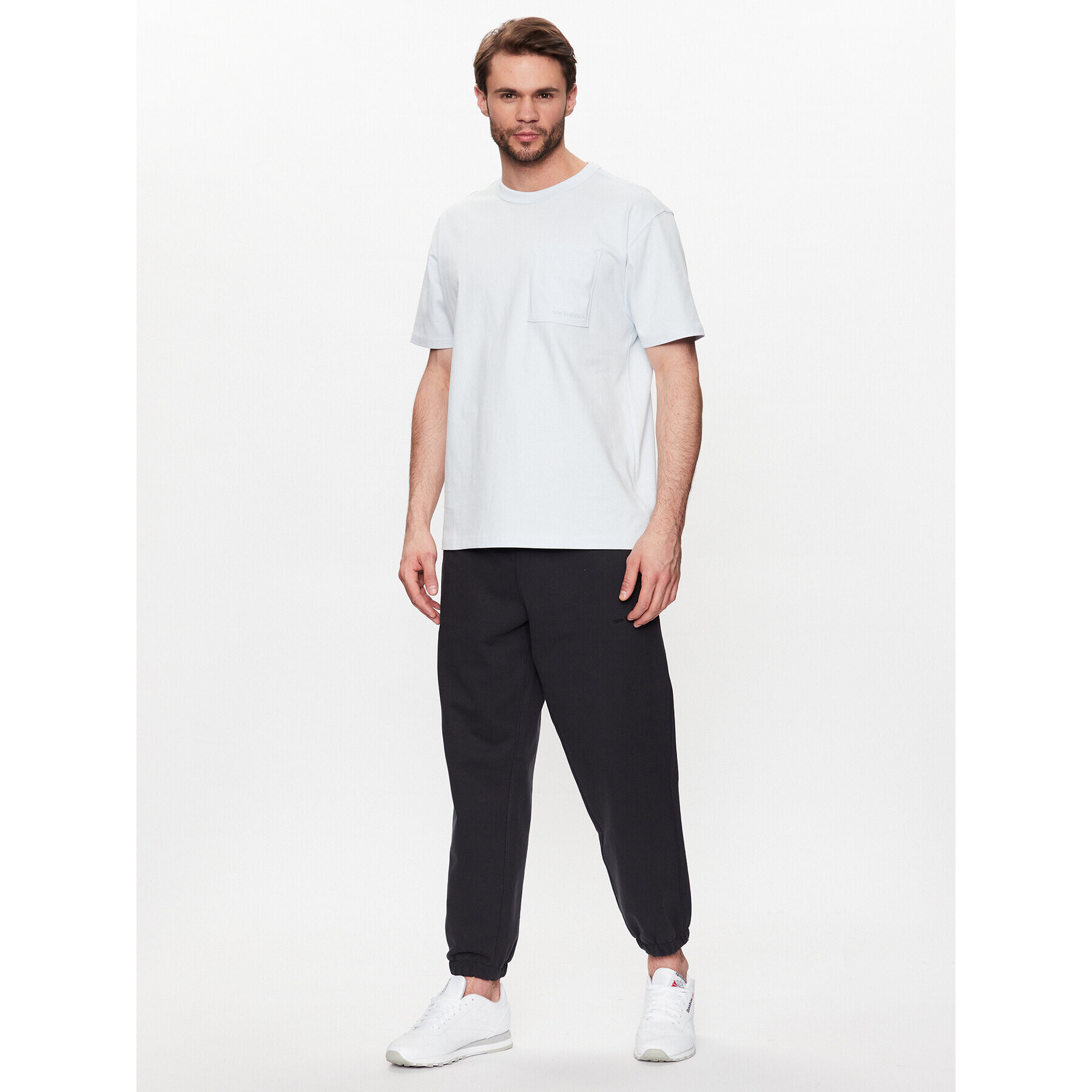 New Balance Долнище анцуг MP23551 Черен Relaxed Fit - Pepit.bg
