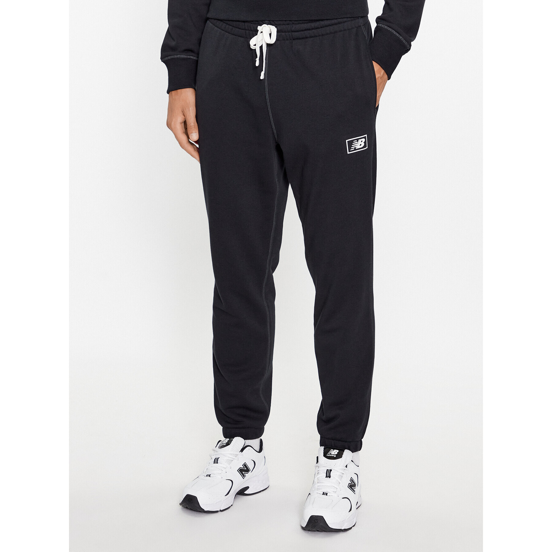 New Balance Долнище анцуг NB Essentials Sweatpant MP33509 Черен Regular Fit - Pepit.bg