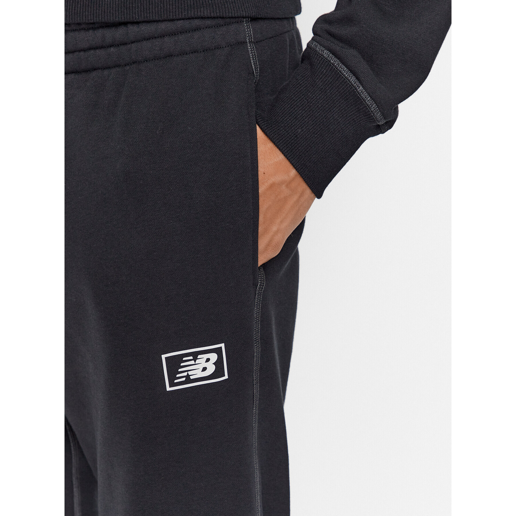 New Balance Долнище анцуг NB Essentials Sweatpant MP33509 Черен Regular Fit - Pepit.bg