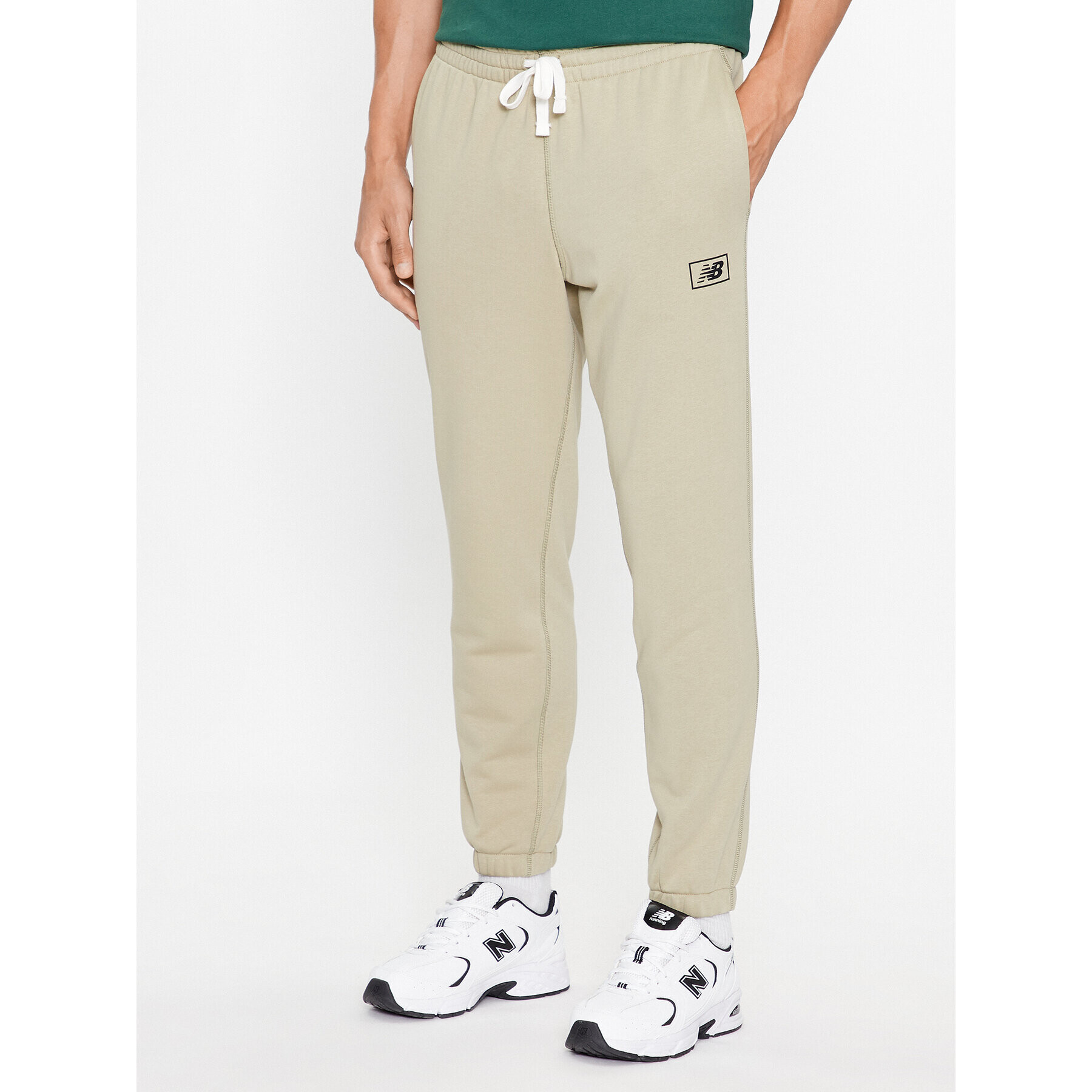 New Balance Долнище анцуг NB Essentials Sweatpant MP33509 Зелен Regular Fit - Pepit.bg