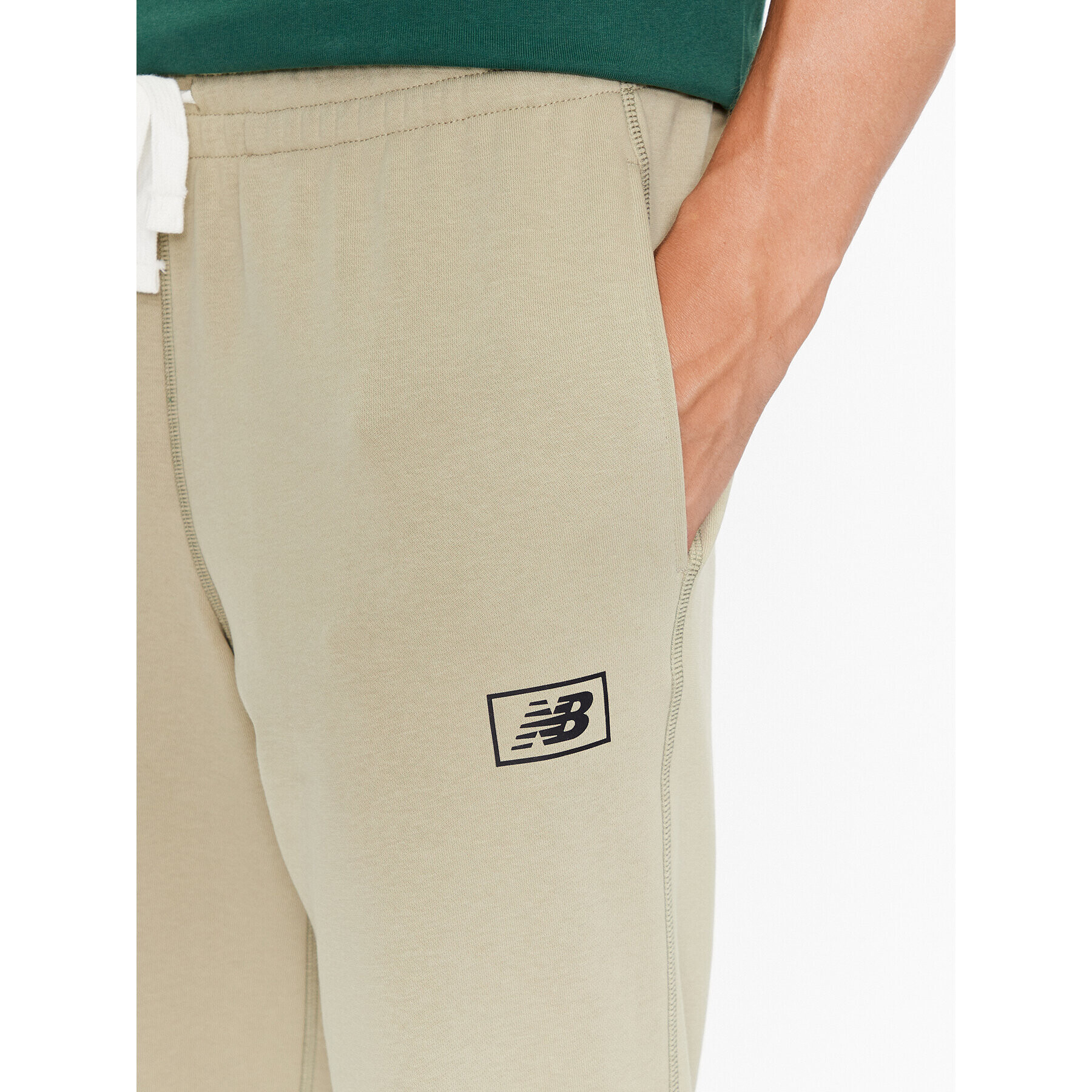 New Balance Долнище анцуг NB Essentials Sweatpant MP33509 Зелен Regular Fit - Pepit.bg