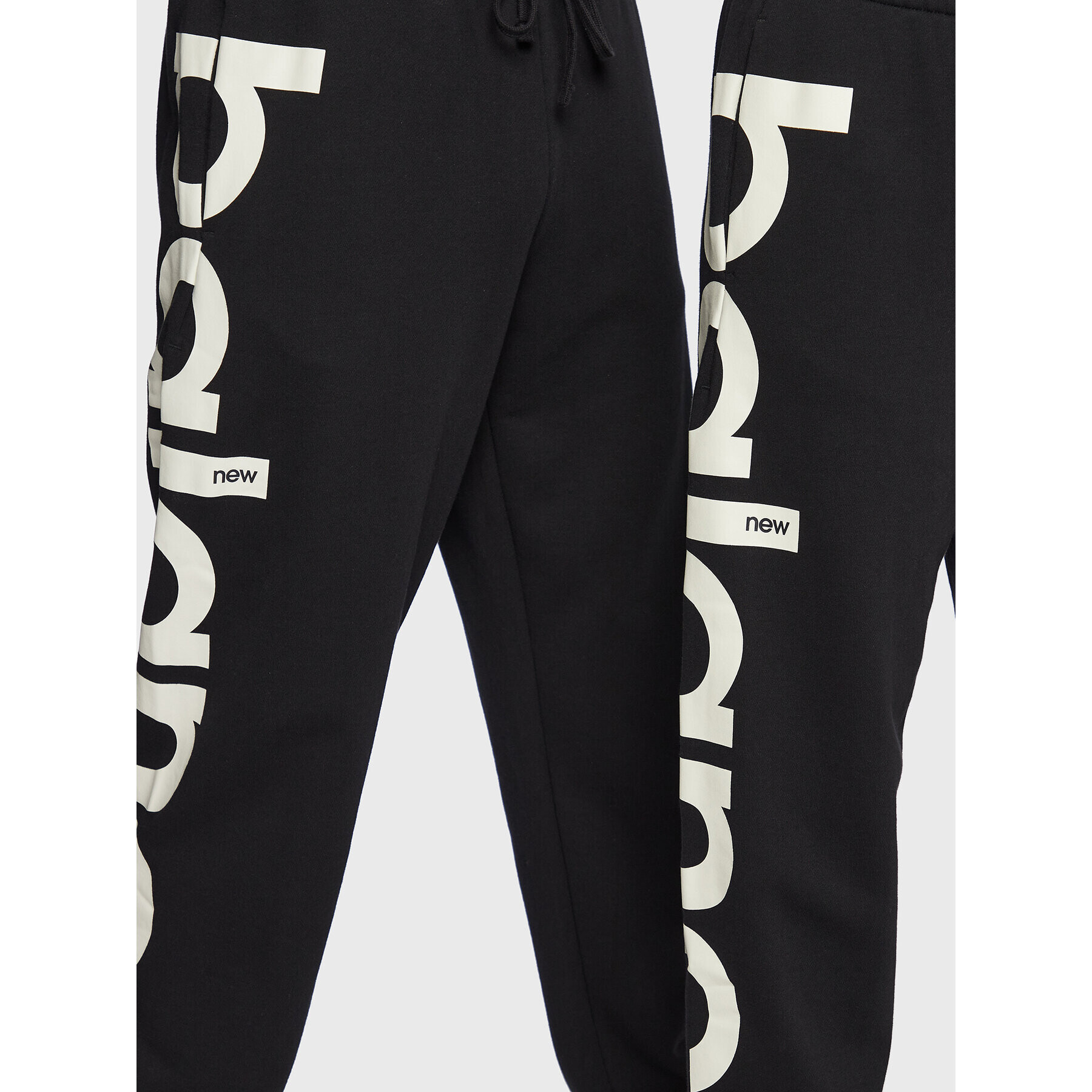 New Balance Долнище анцуг Unisex NBUP235 Черен Oversize - Pepit.bg