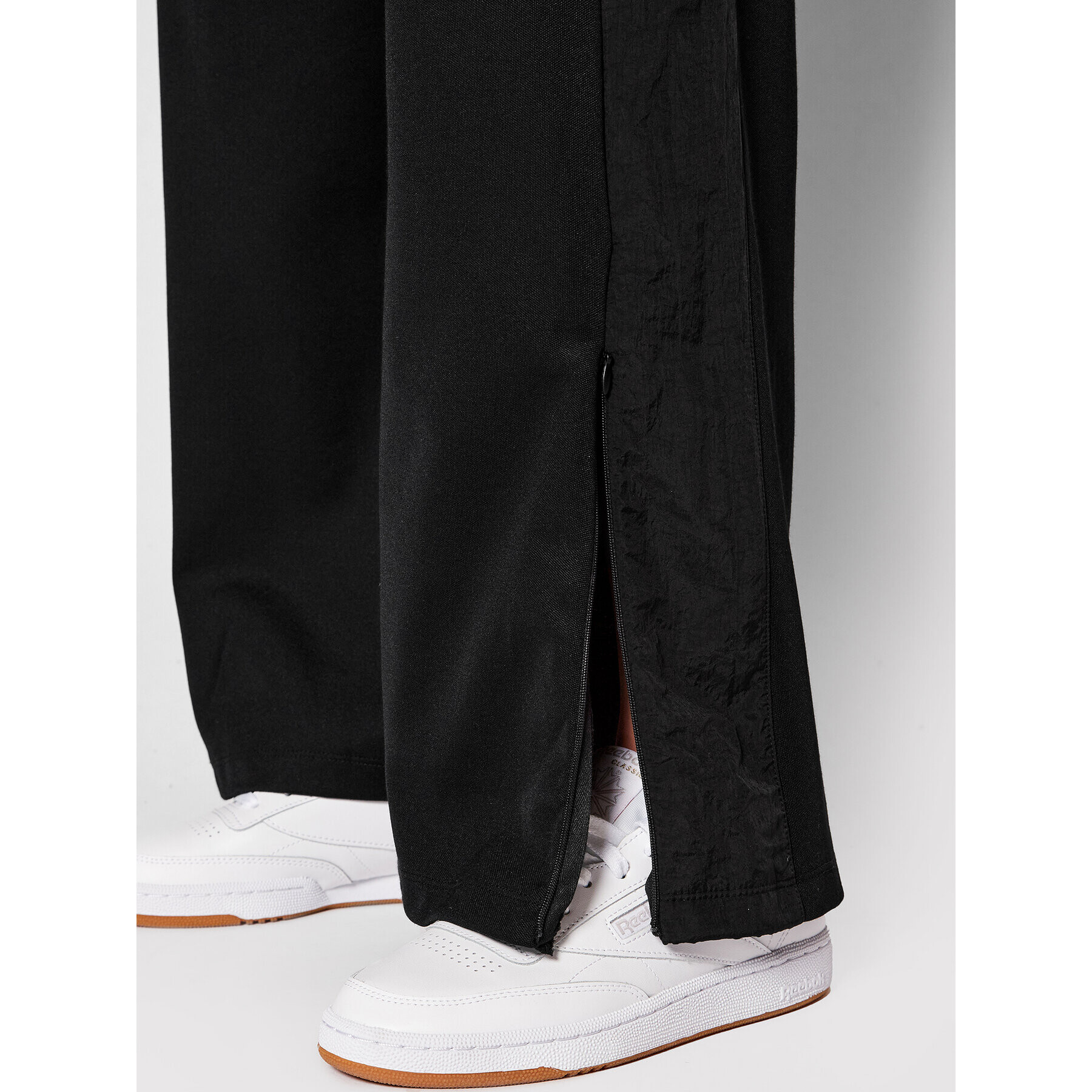 New Balance Долнище анцуг WP21502 Черен Relaxed Fit - Pepit.bg