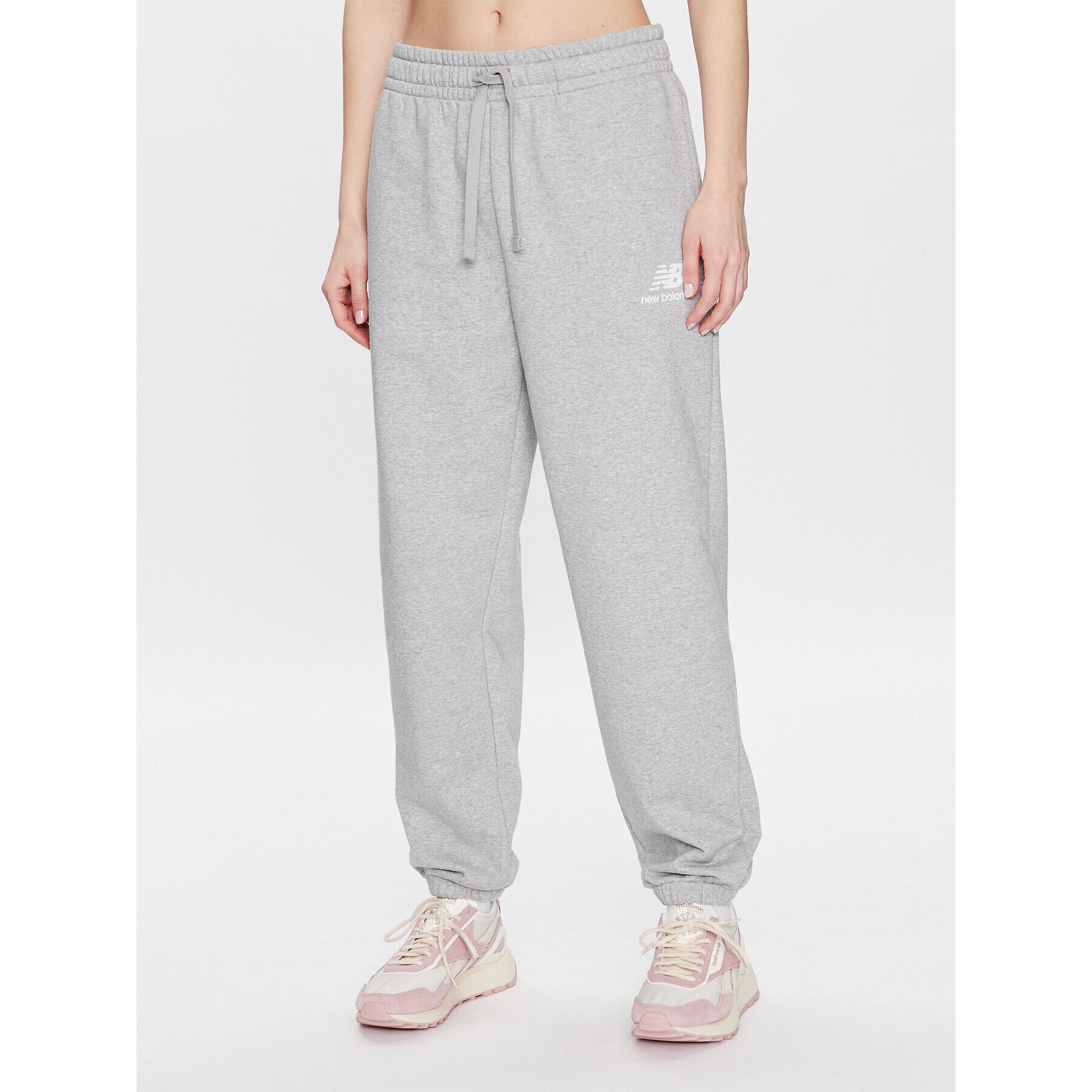 New Balance Долнище анцуг WP31530 Сив Relaxed Fit - Pepit.bg