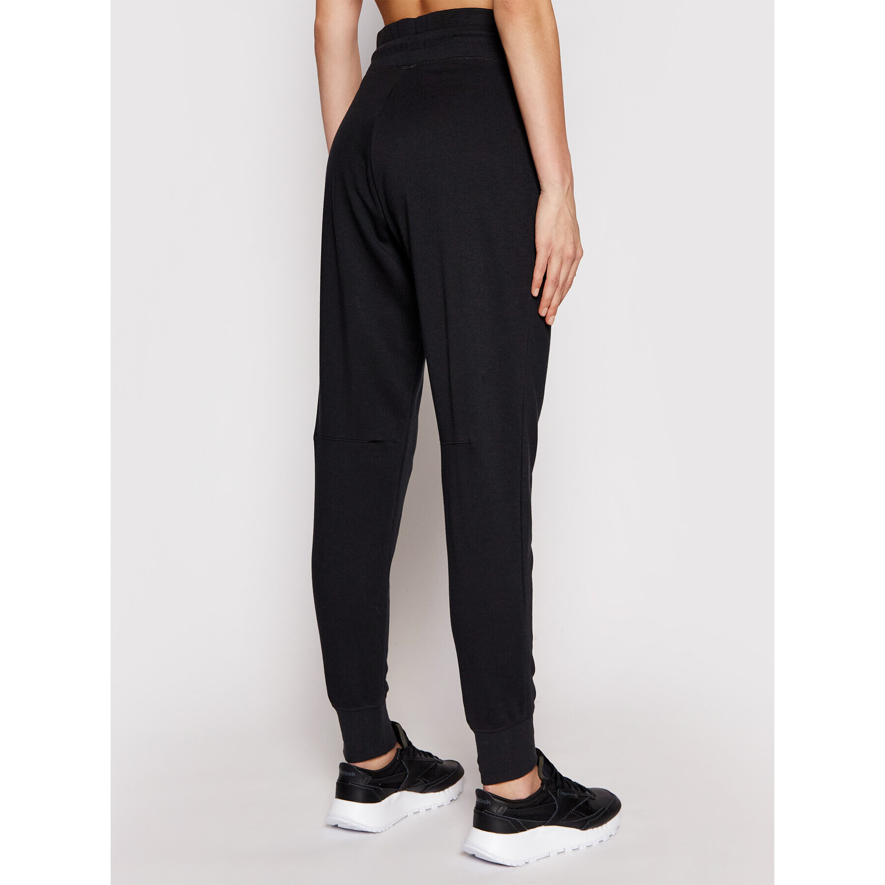 New Balance Долнище анцуг Esse NBWP03530 Черен Regular Fit - Pepit.bg