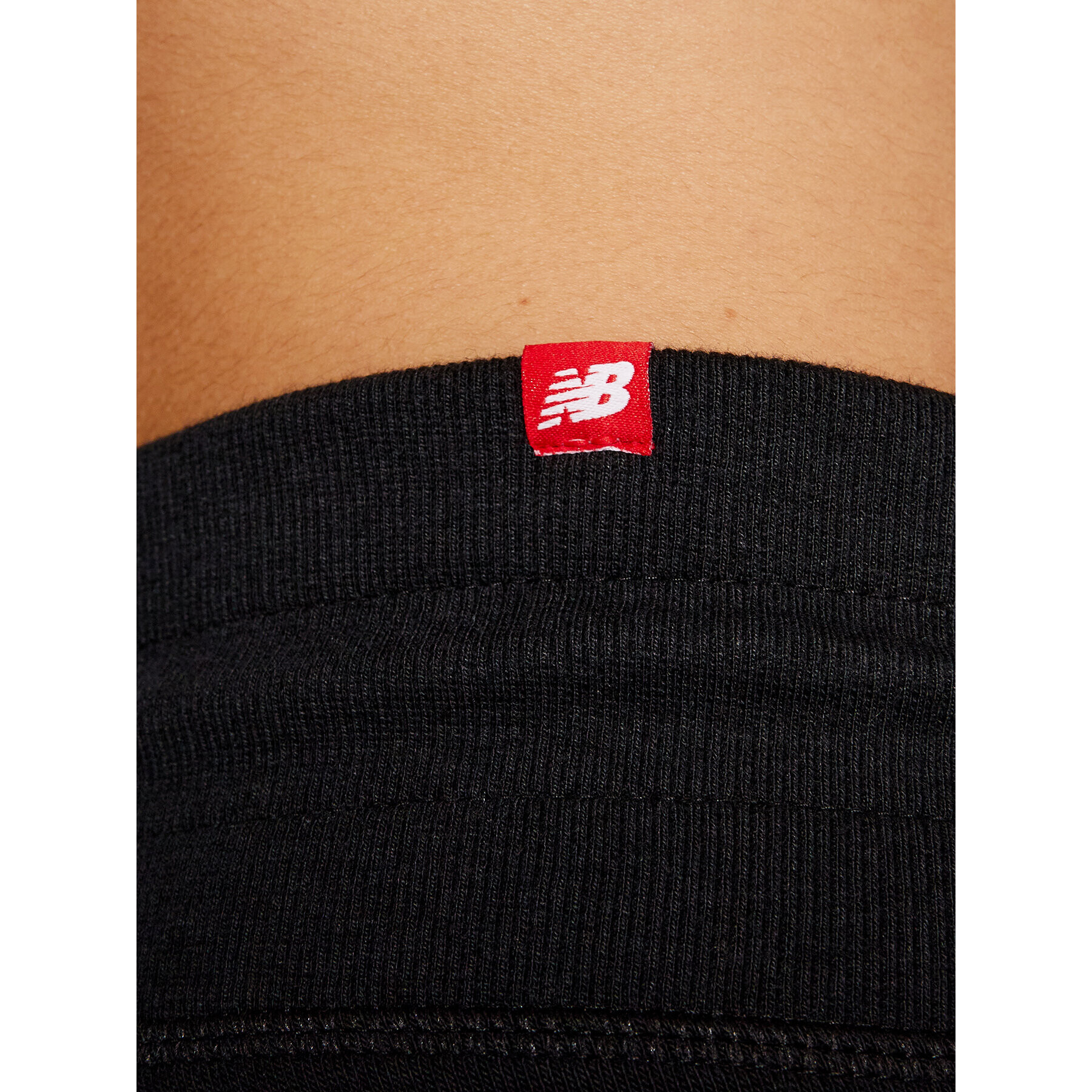 New Balance Долнище анцуг Esse NBWP03530 Черен Regular Fit - Pepit.bg