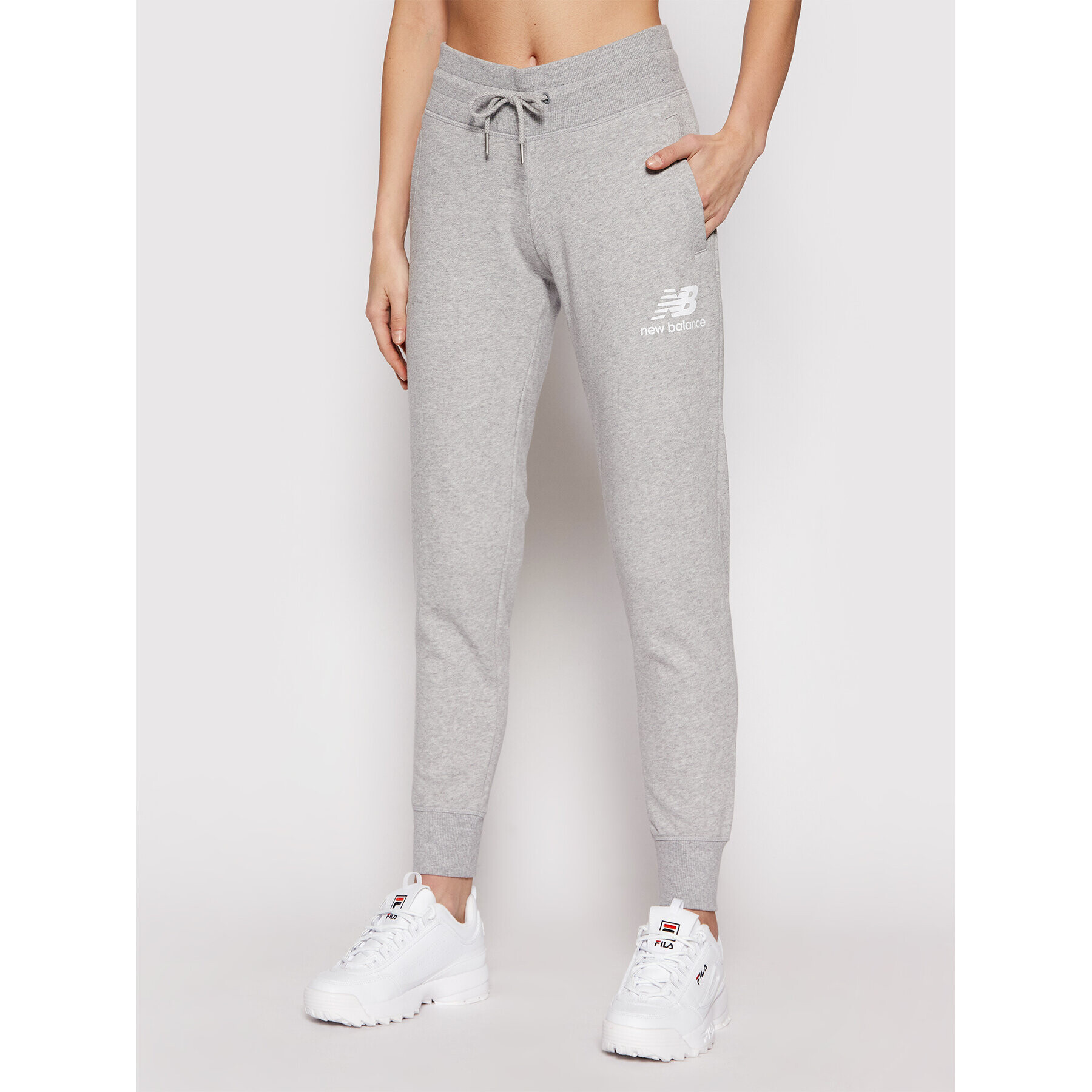New Balance Долнище анцуг Esse NBWP03530 Сив Regular Fit - Pepit.bg