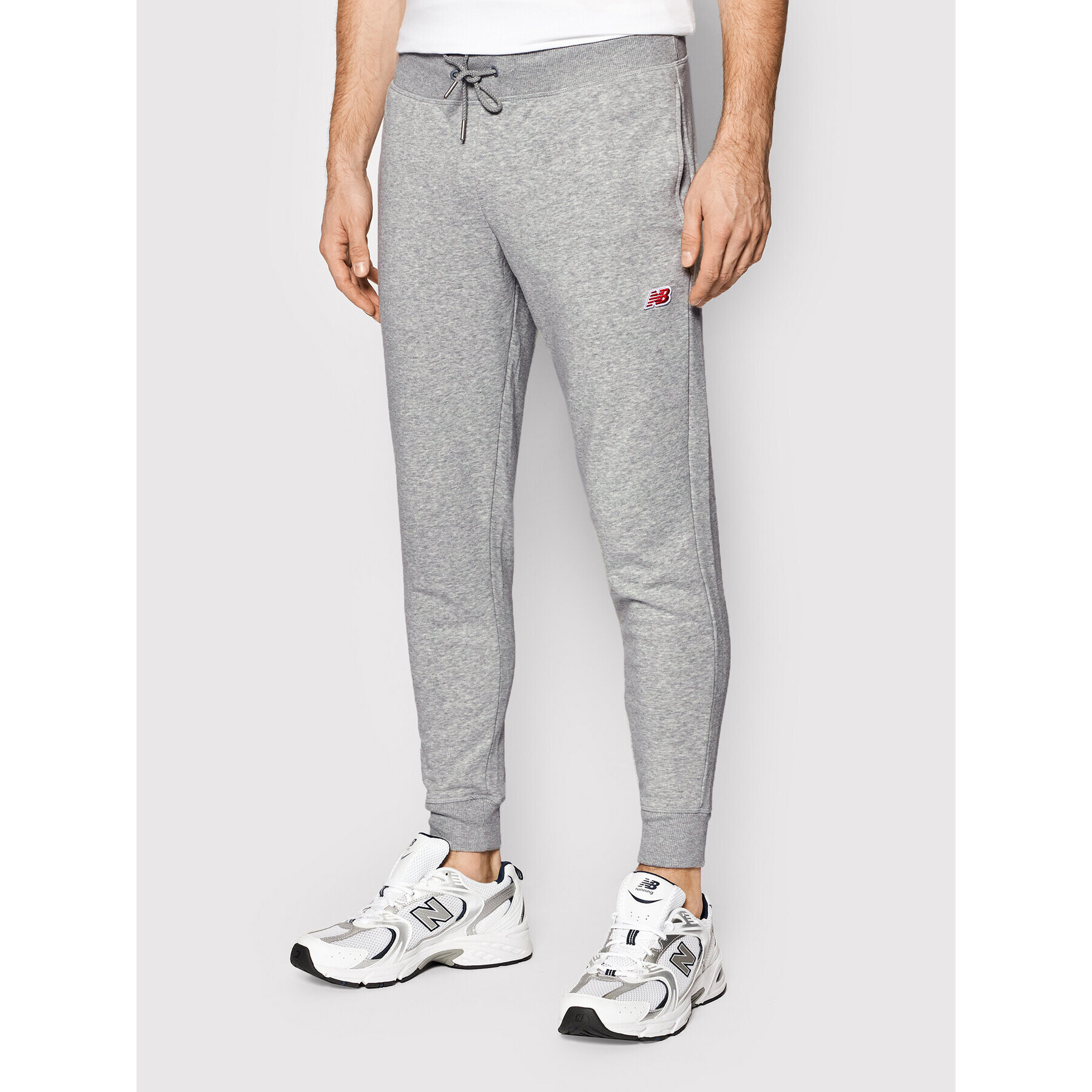 New Balance Долнище анцуг Small Pack MP01664 Сив Athletic Fit - Pepit.bg