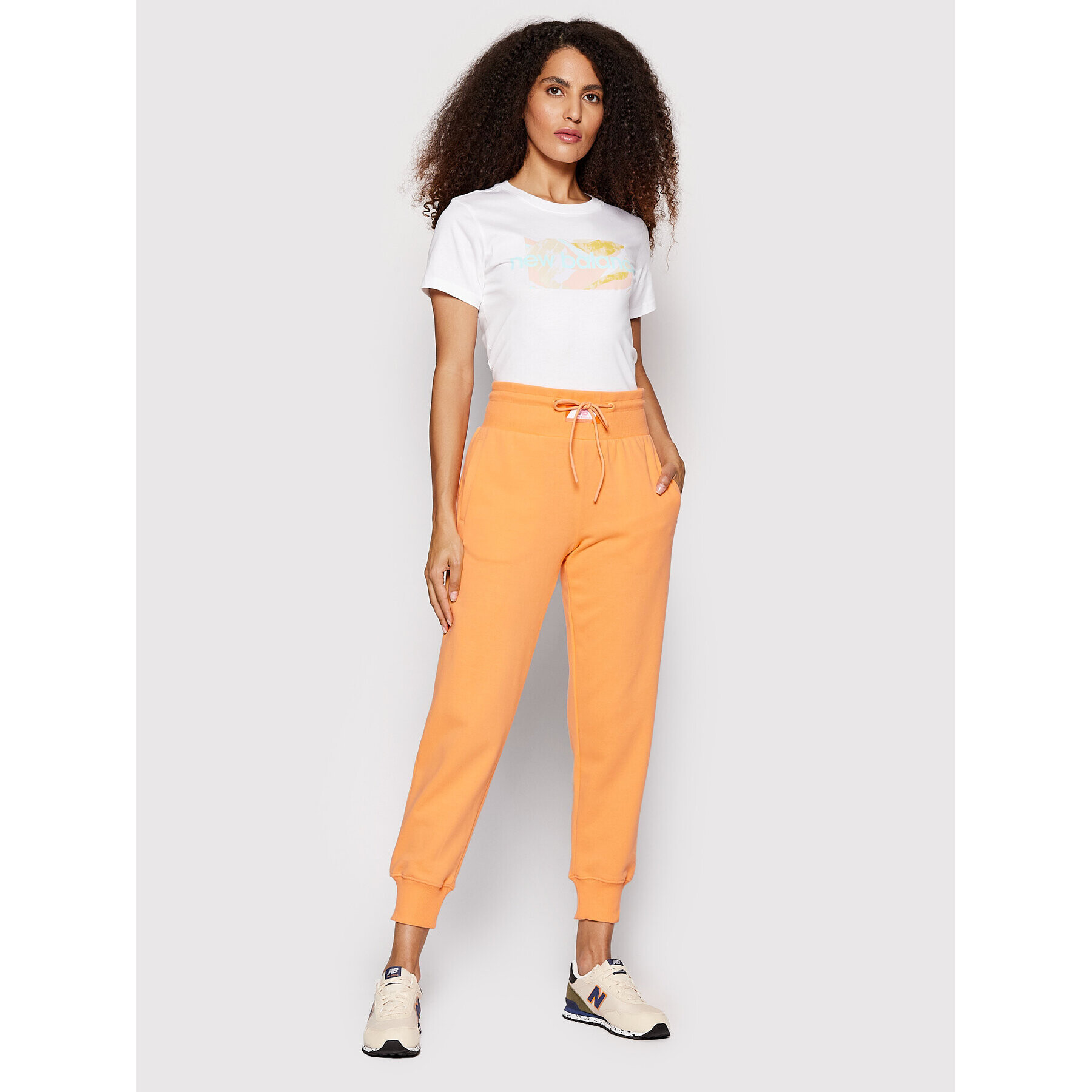 New Balance Долнище анцуг WP21503 Оранжев Relaxed Fit - Pepit.bg