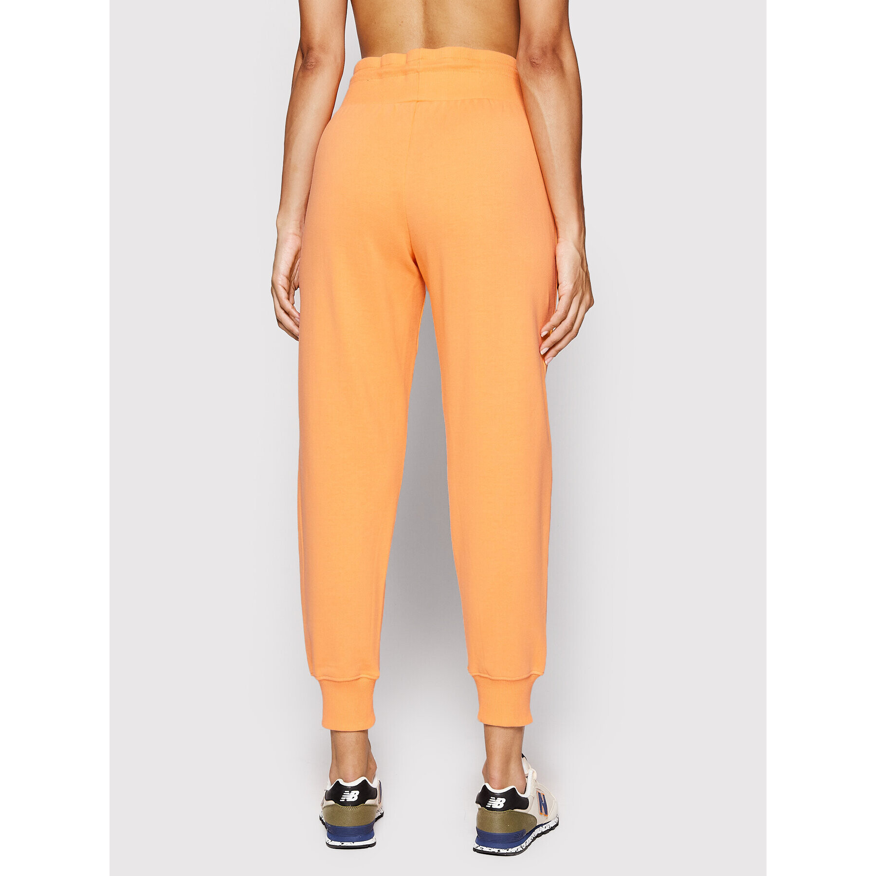 New Balance Долнище анцуг WP21503 Оранжев Relaxed Fit - Pepit.bg