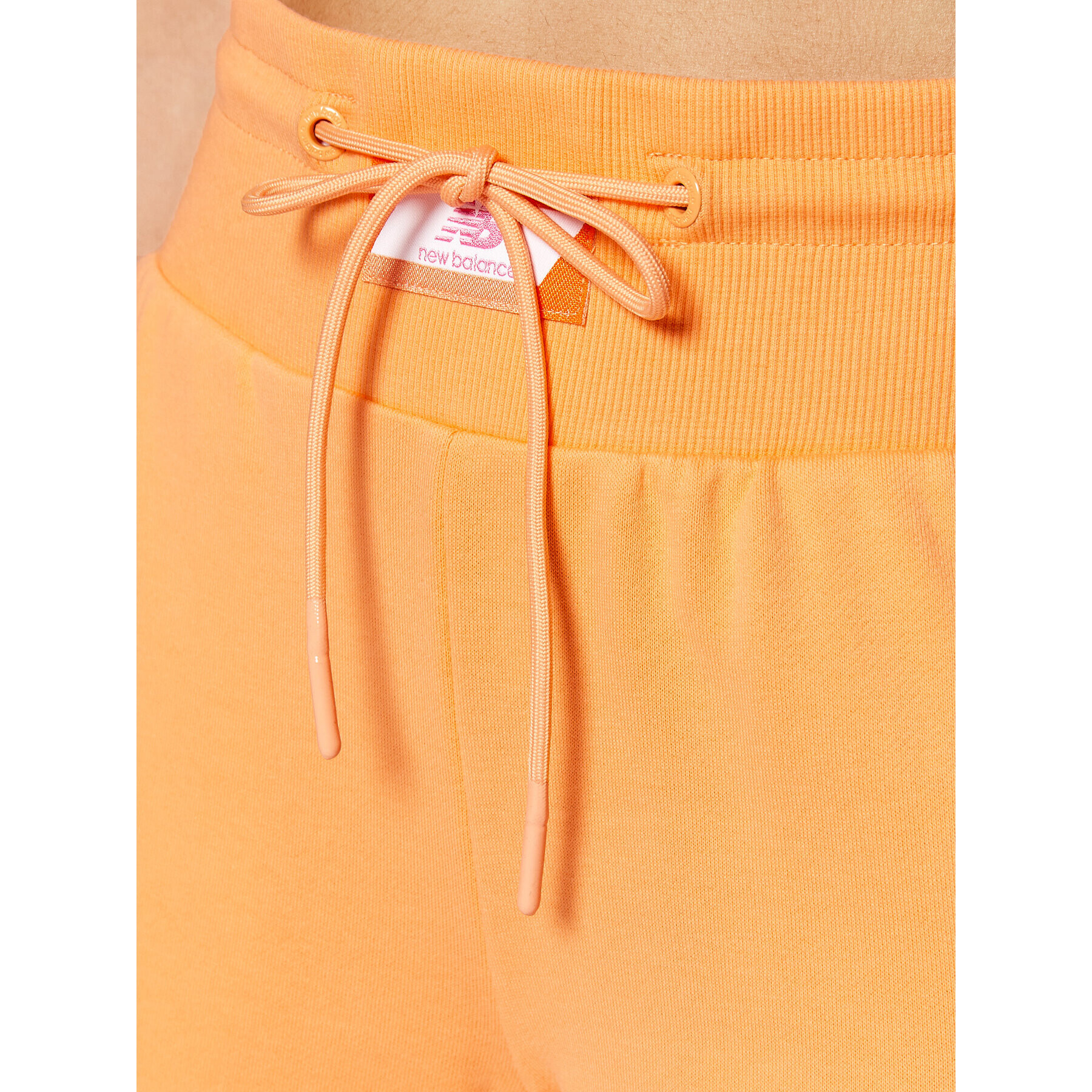 New Balance Долнище анцуг WP21503 Оранжев Relaxed Fit - Pepit.bg