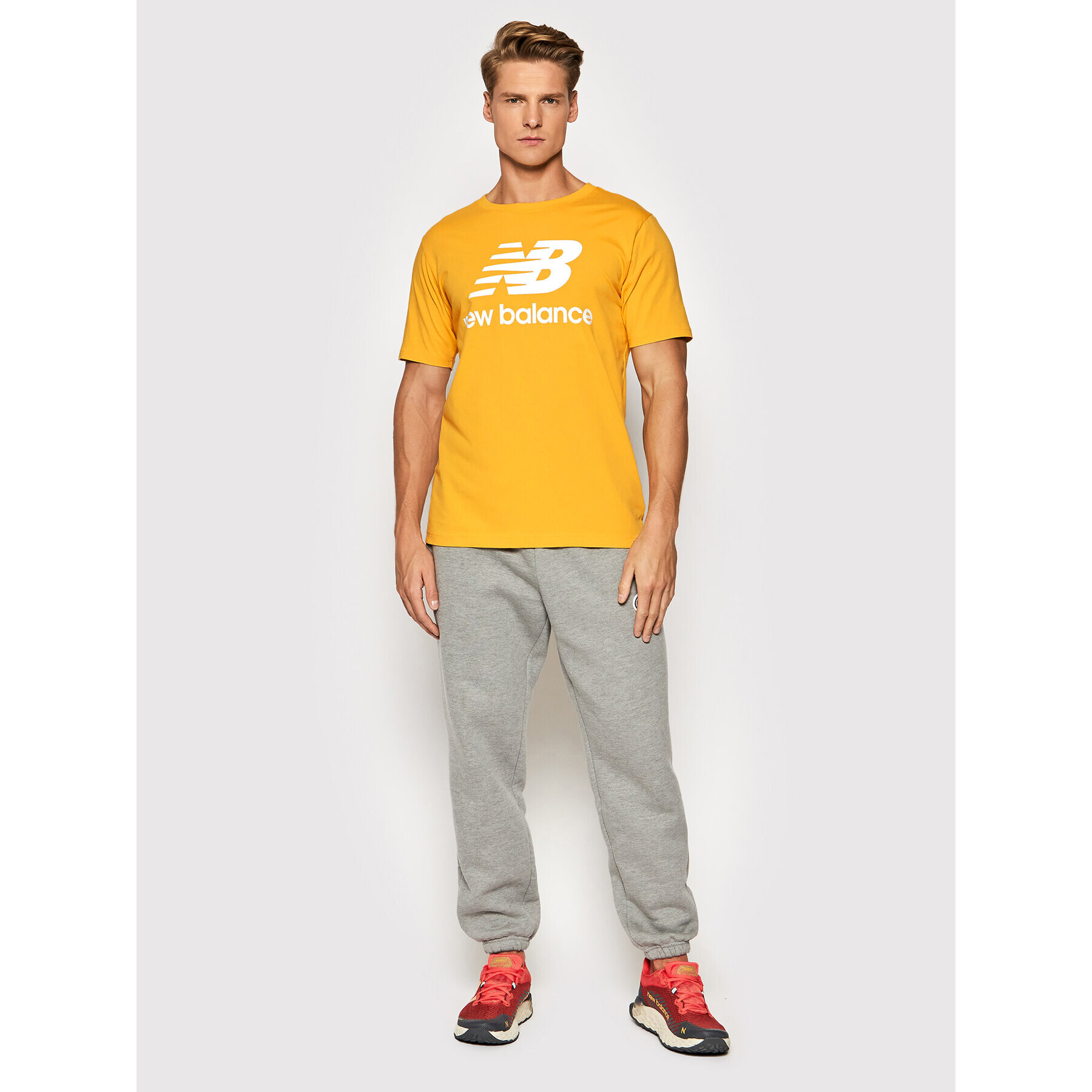 New Balance Тишърт Essential Logo MT01575 Жълт Athletic Fit - Pepit.bg