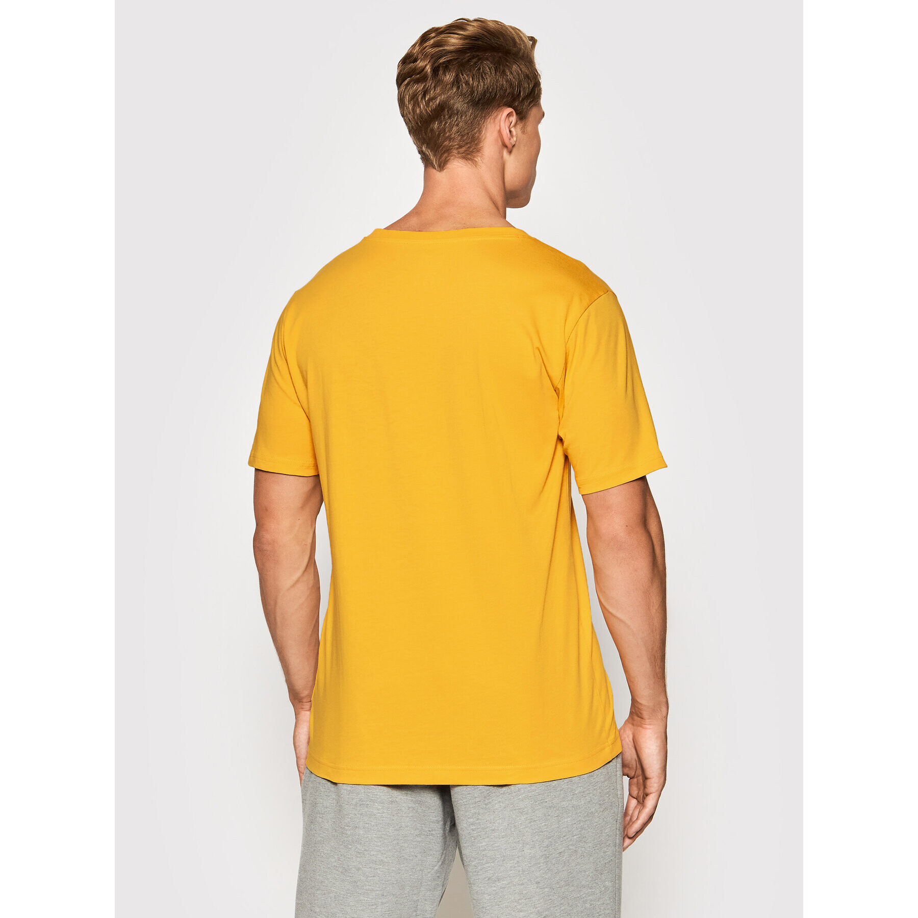 New Balance Тишърт Essential Logo MT01575 Жълт Athletic Fit - Pepit.bg