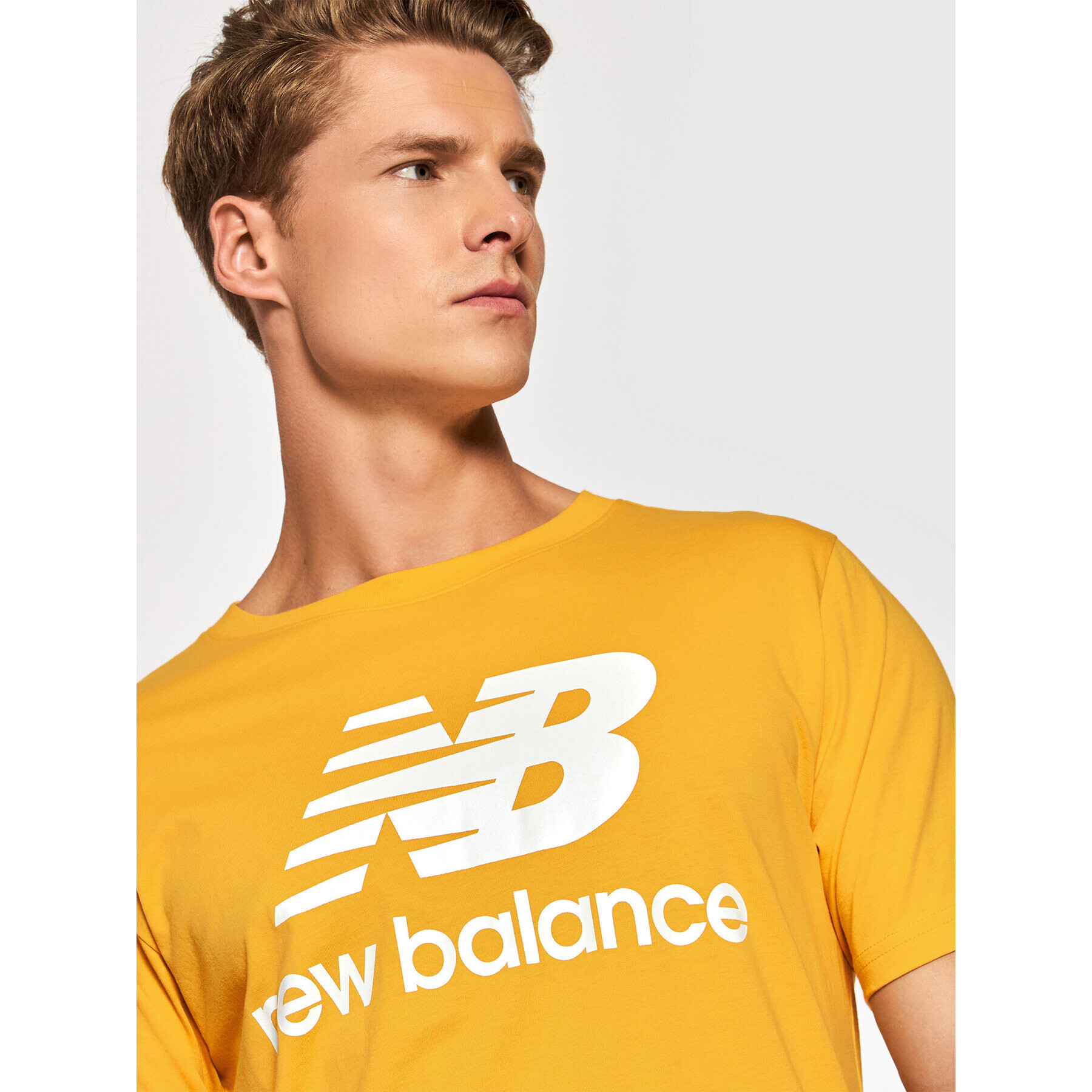 New Balance Тишърт Essential Logo MT01575 Жълт Athletic Fit - Pepit.bg