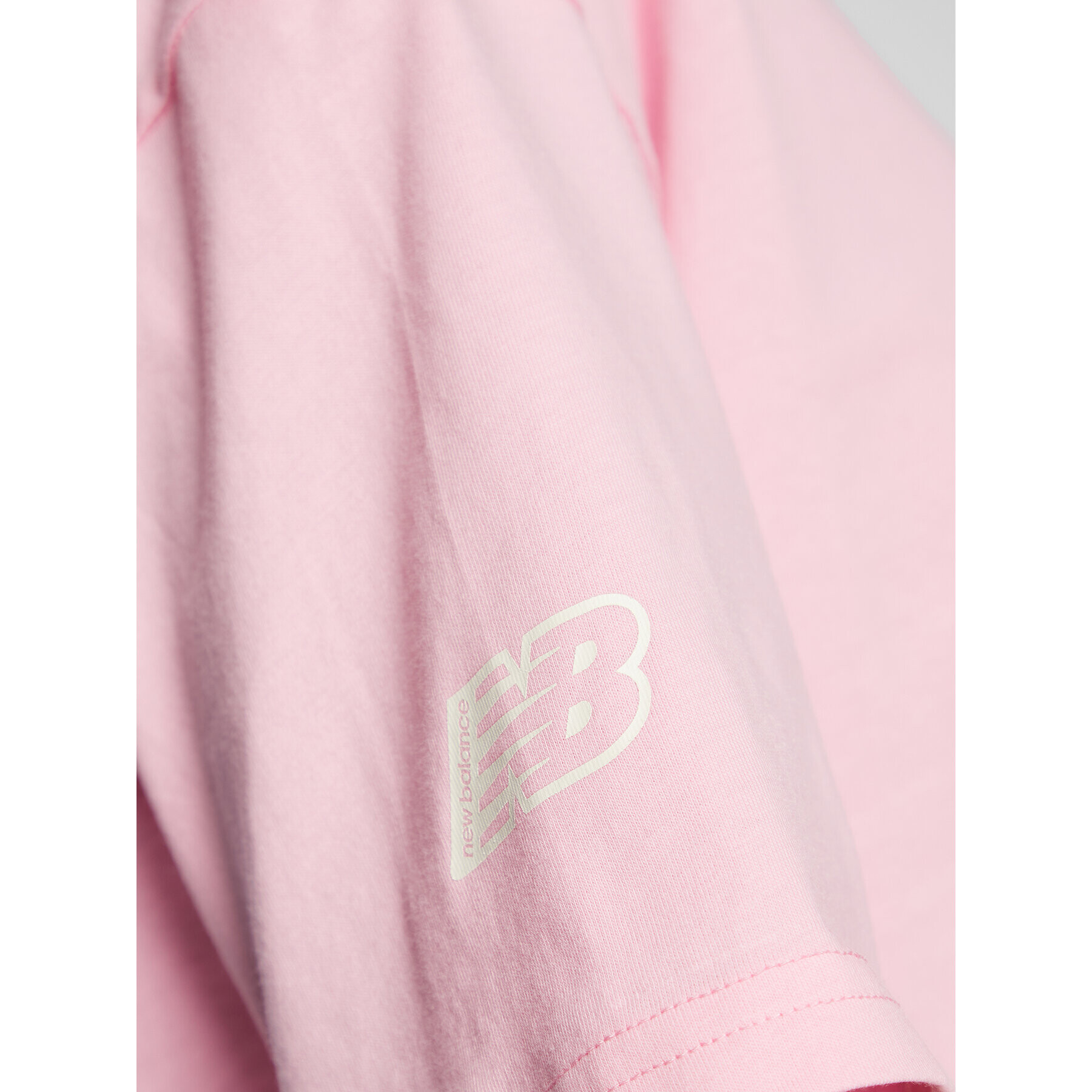 New Balance Тишърт Essentials Graphic WT23513 Розов Relaxed Fit - Pepit.bg