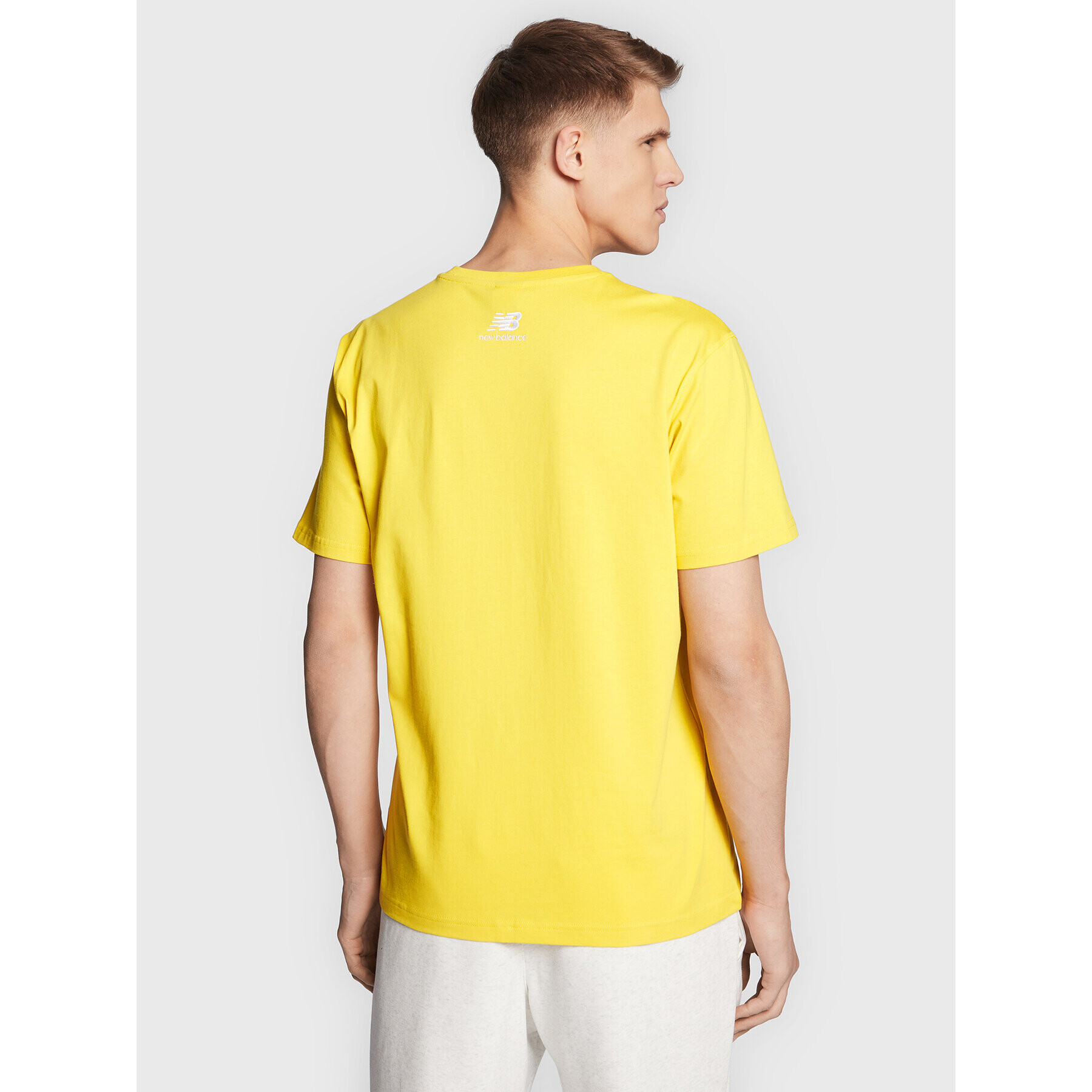 New Balance Тишърт MT23502 Жълт Relaxed Fit - Pepit.bg
