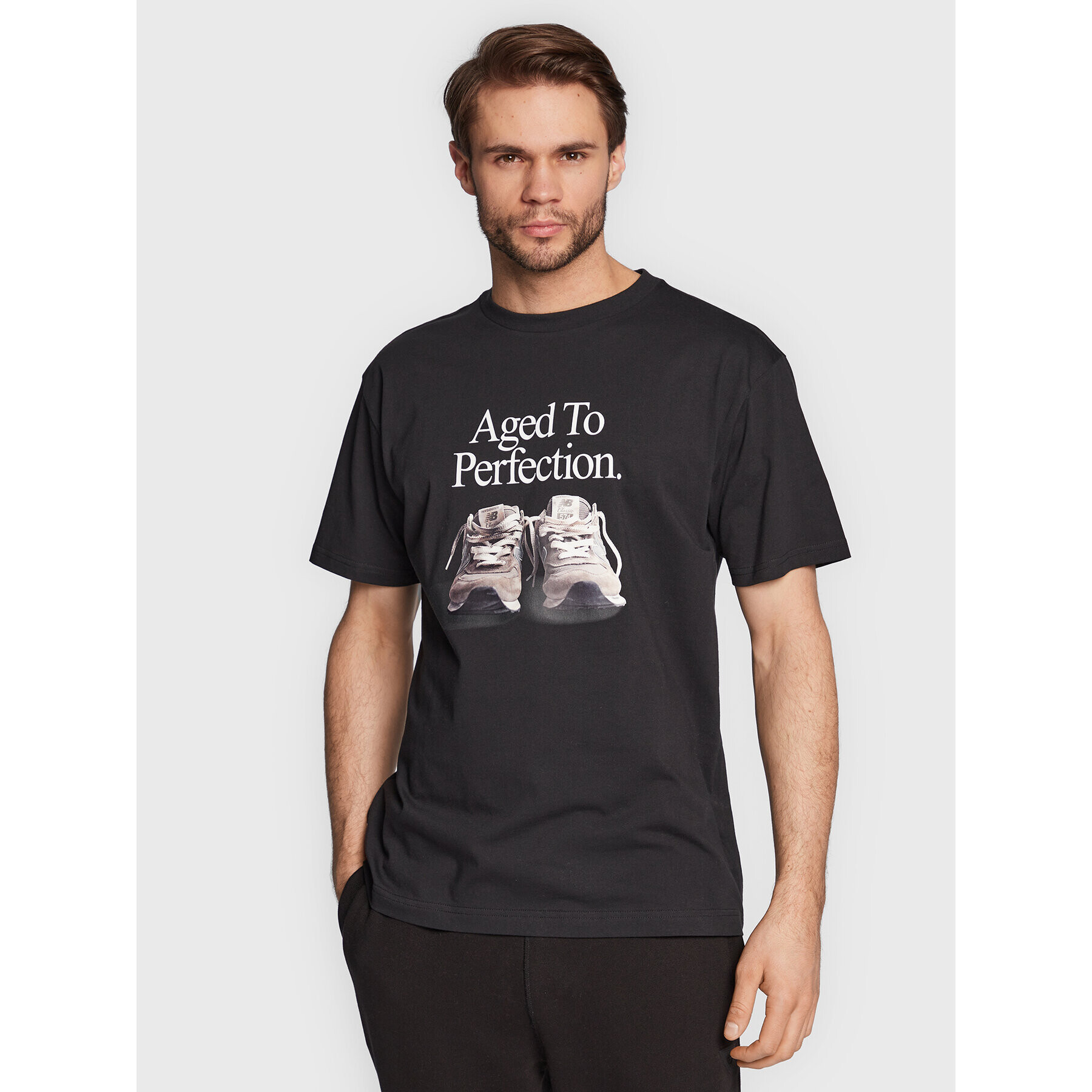 New Balance Тишърт MT23569 Черен Relaxed Fit - Pepit.bg