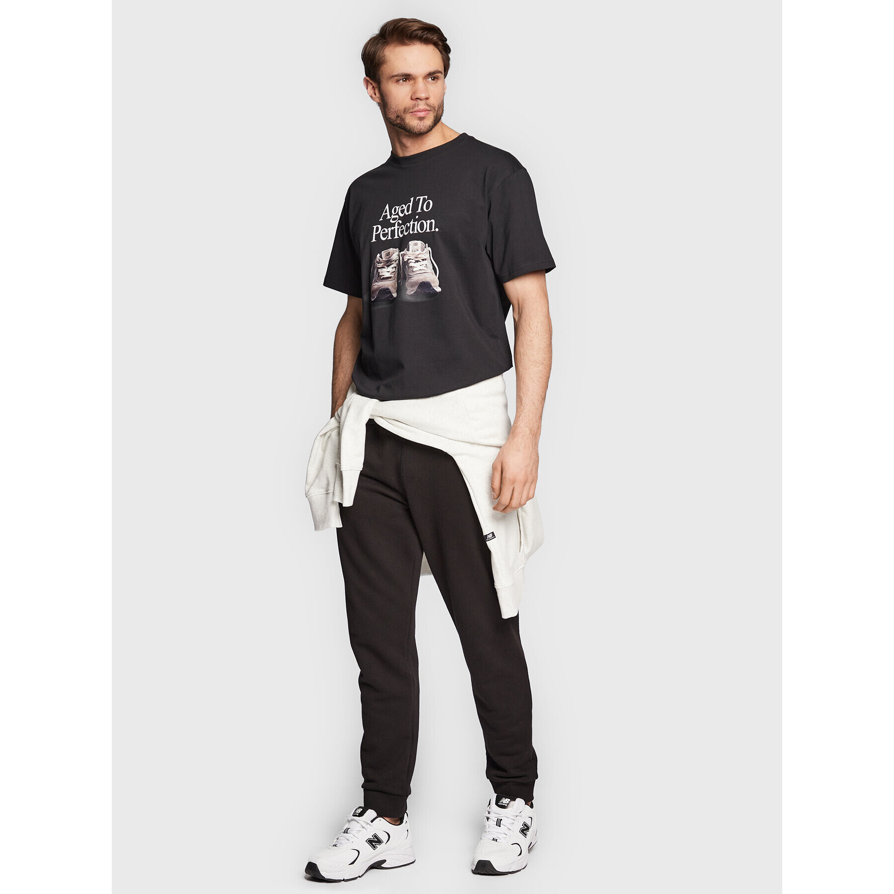 New Balance Тишърт MT23569 Черен Relaxed Fit - Pepit.bg