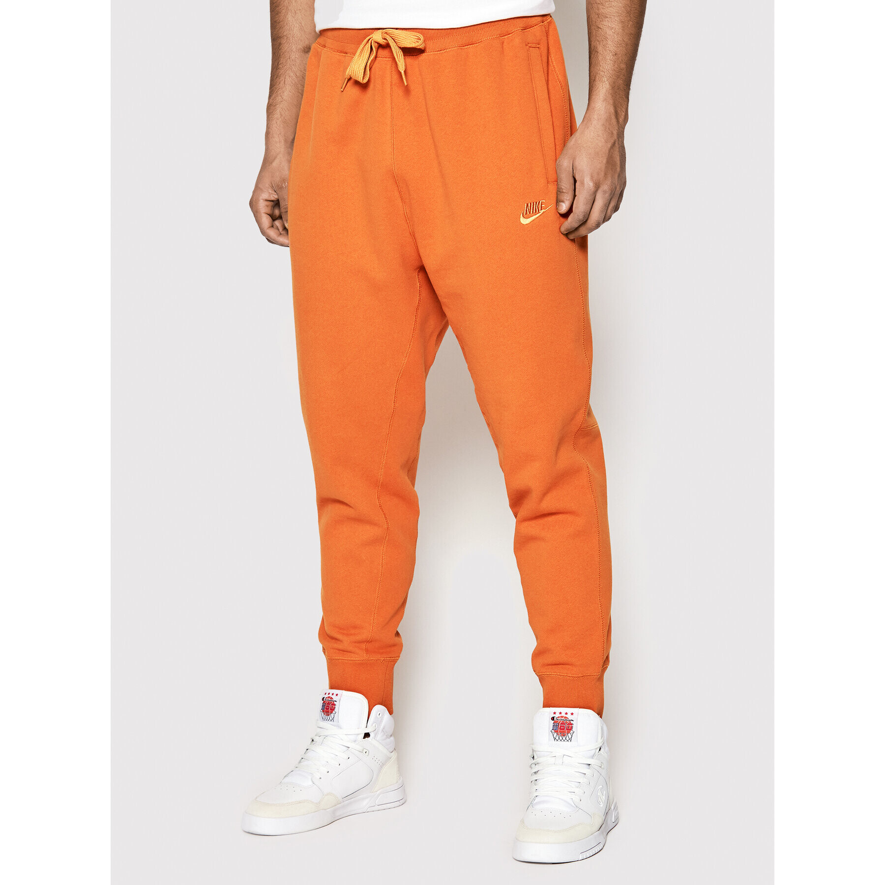 Nike Долнище анцуг Sportswear DA0019 Оранжев Regular Fit - Pepit.bg